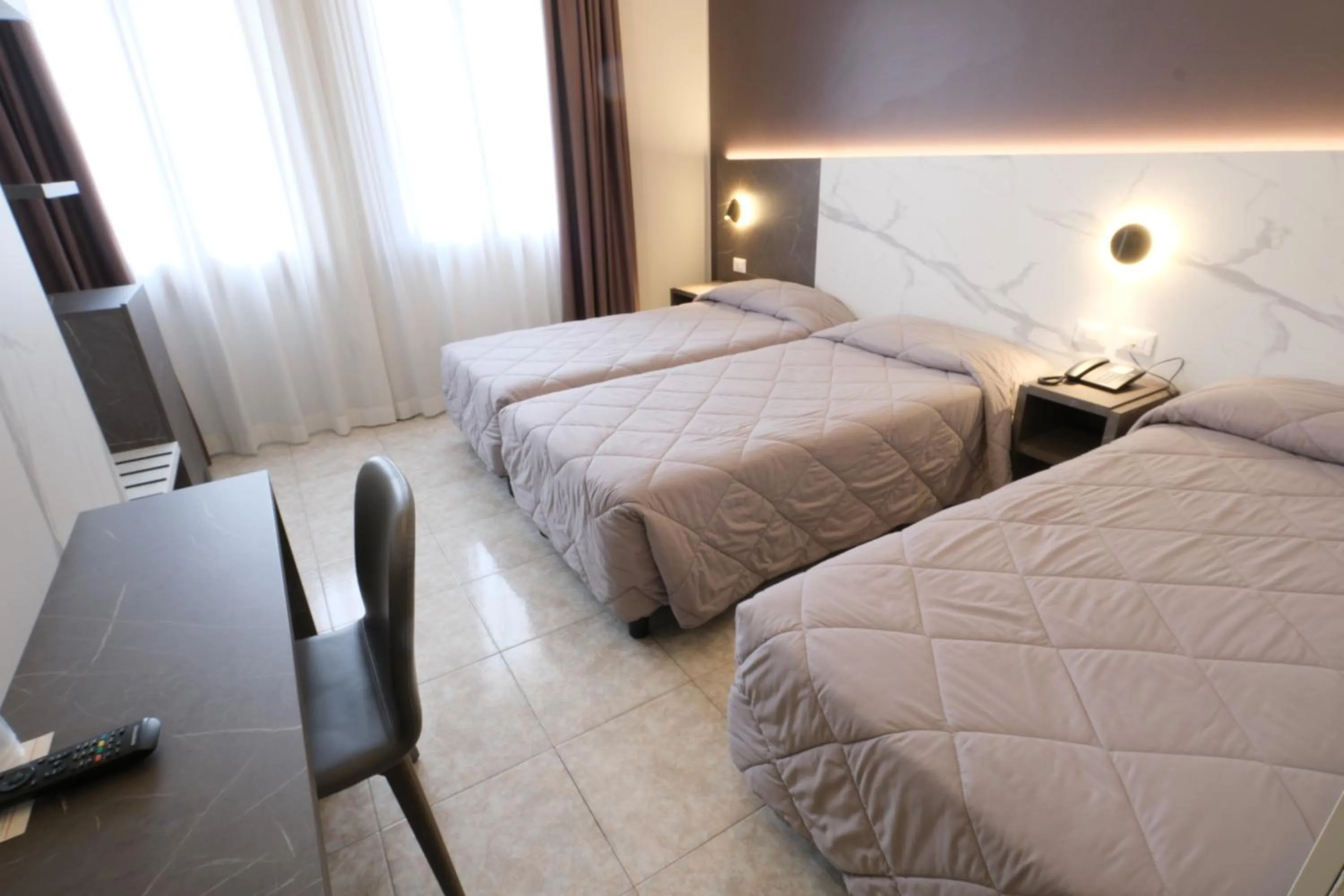 Bed in Hotel Mistral