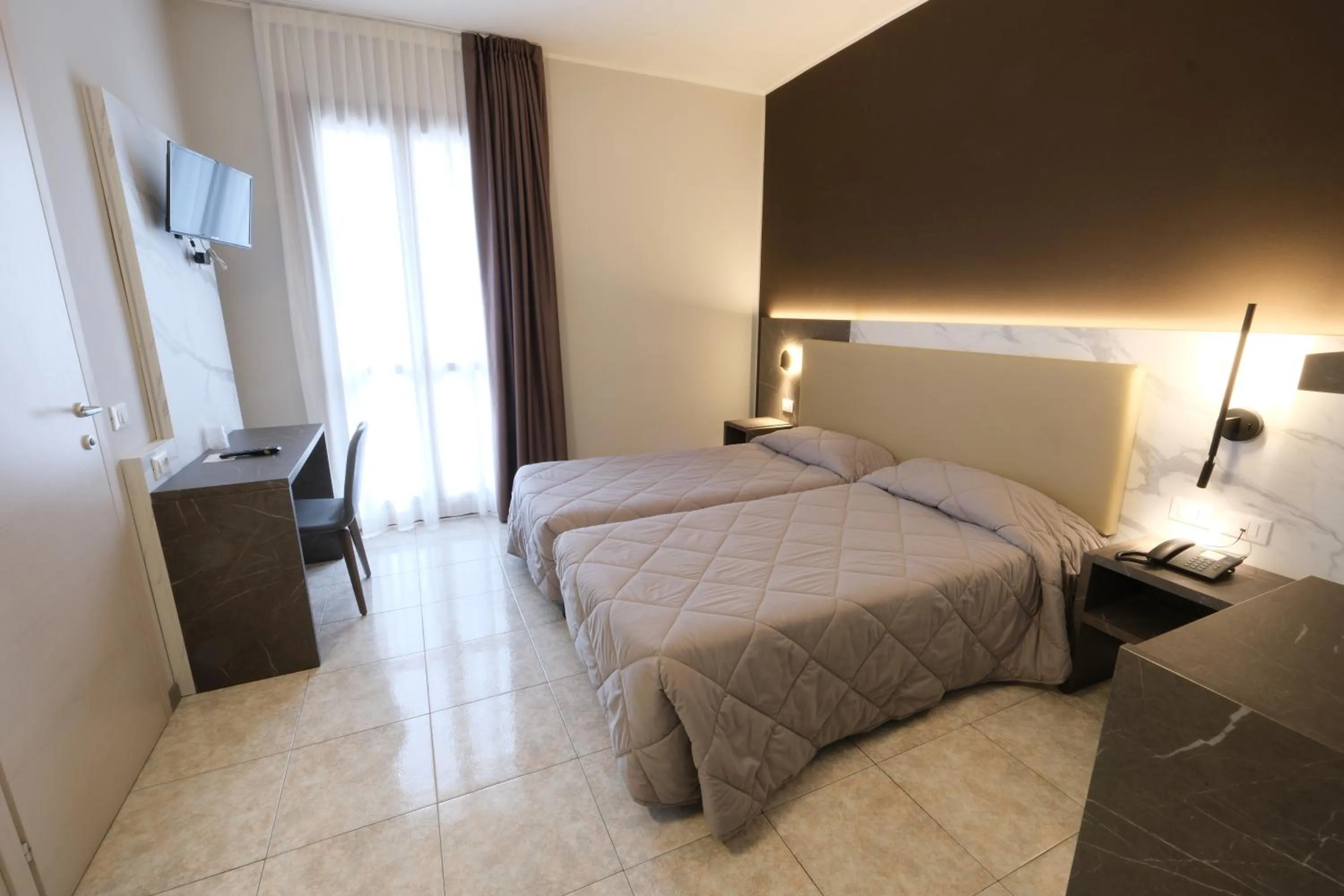 Bed in Hotel Mistral