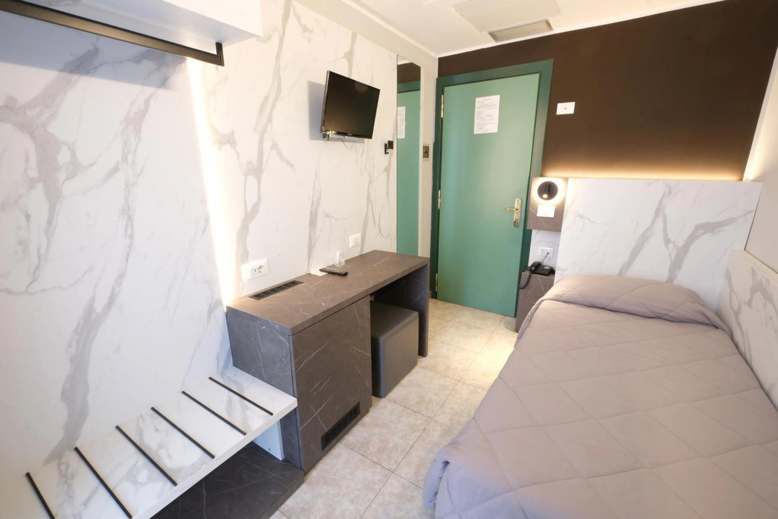 Bed in Hotel Mistral