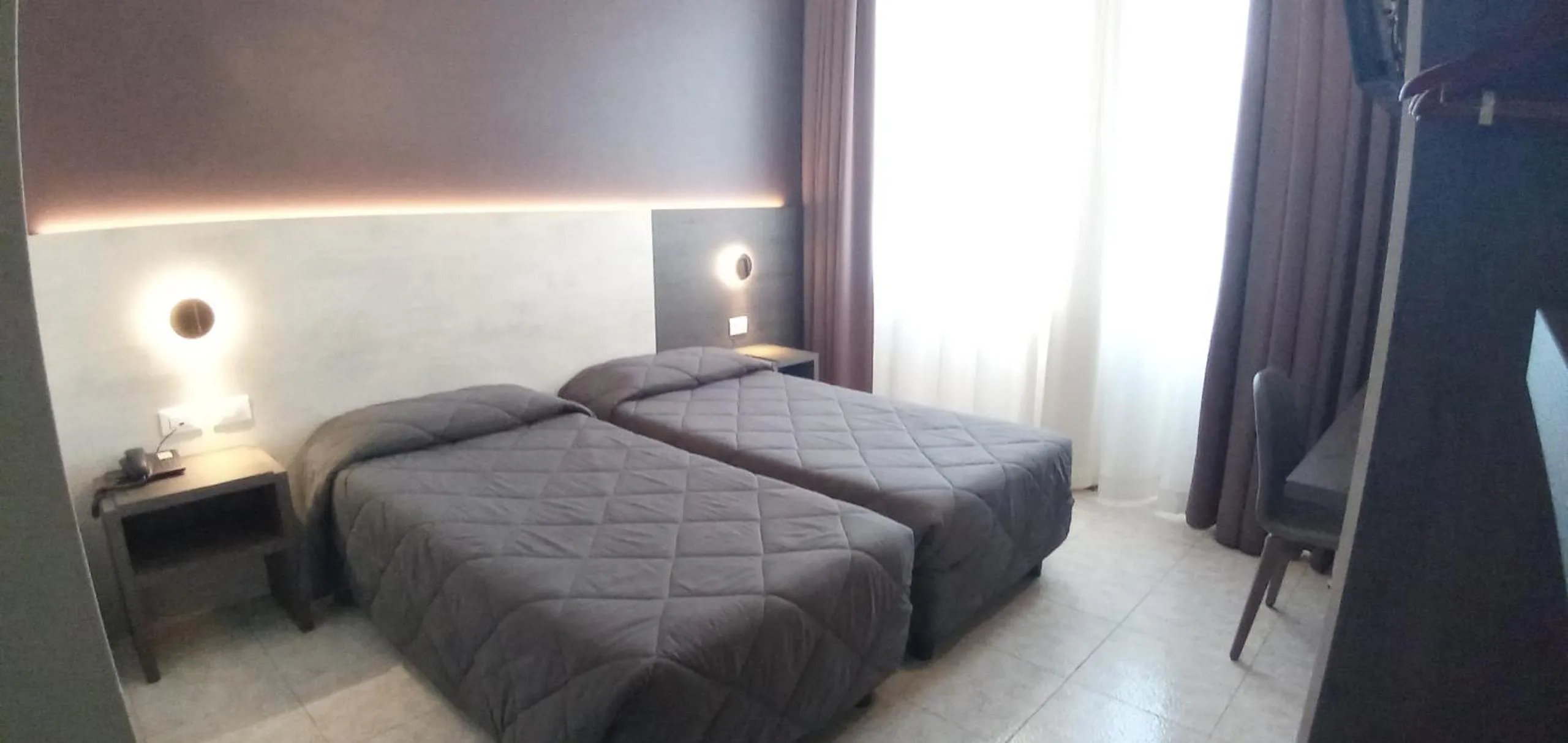 Bed in Hotel Mistral