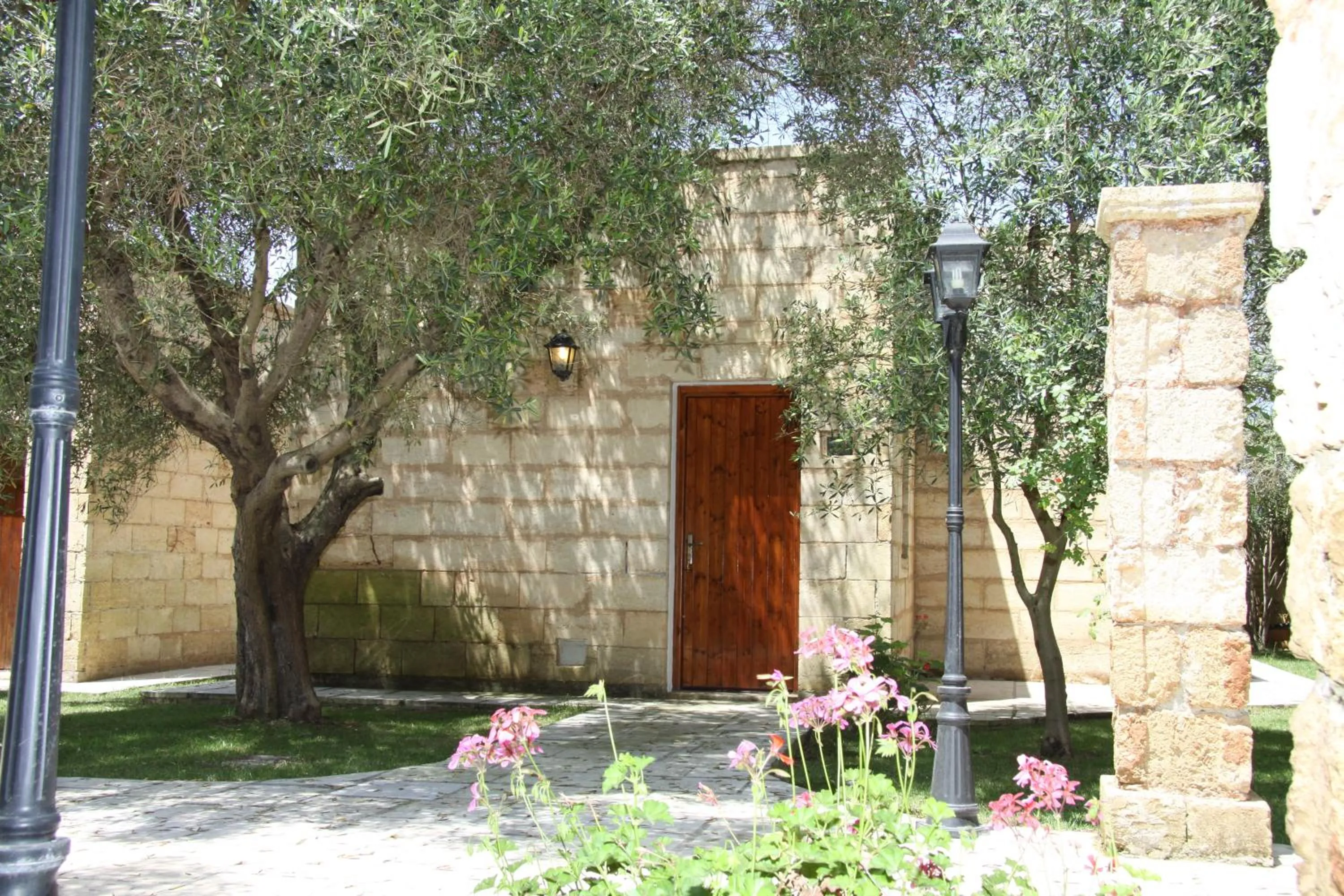 Garden in RELAIS MASSERIA CASINA DEI CARI