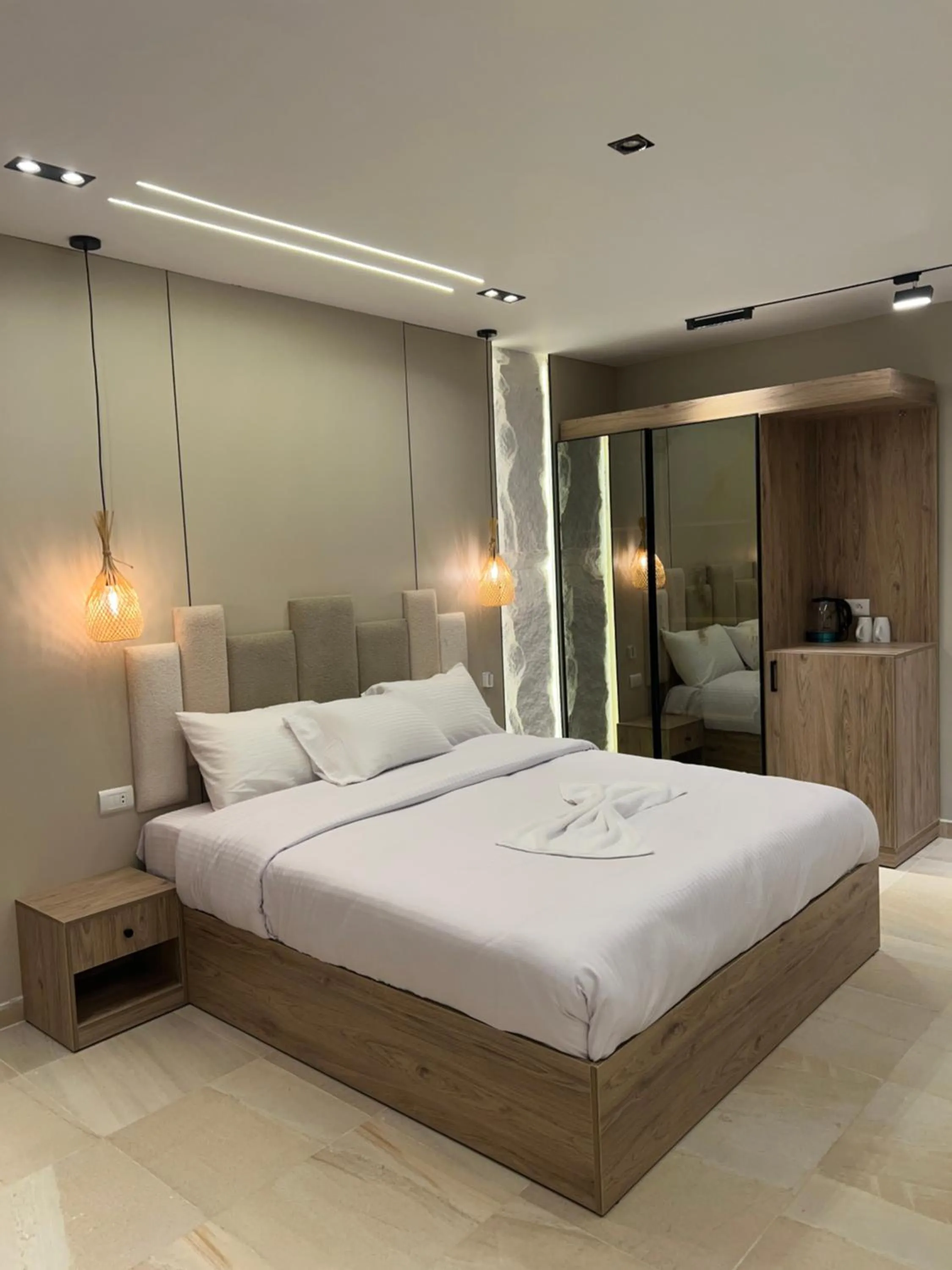 Bed in Pyramids Height Hotel & Pyramids Master Scene Rooftop