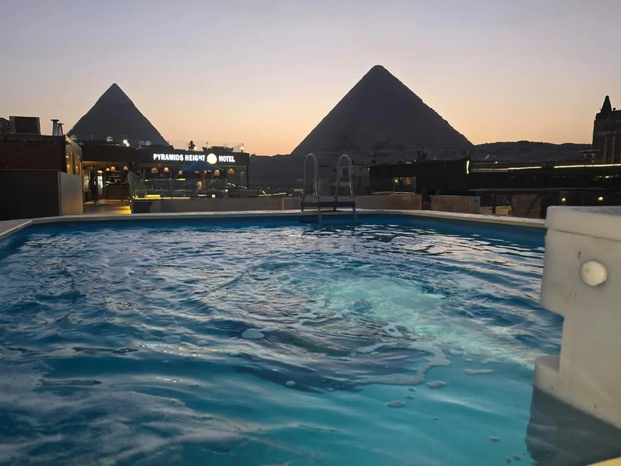 Swimming pool in Pyramids Height Hotel & Pyramids Master Scene Rooftop