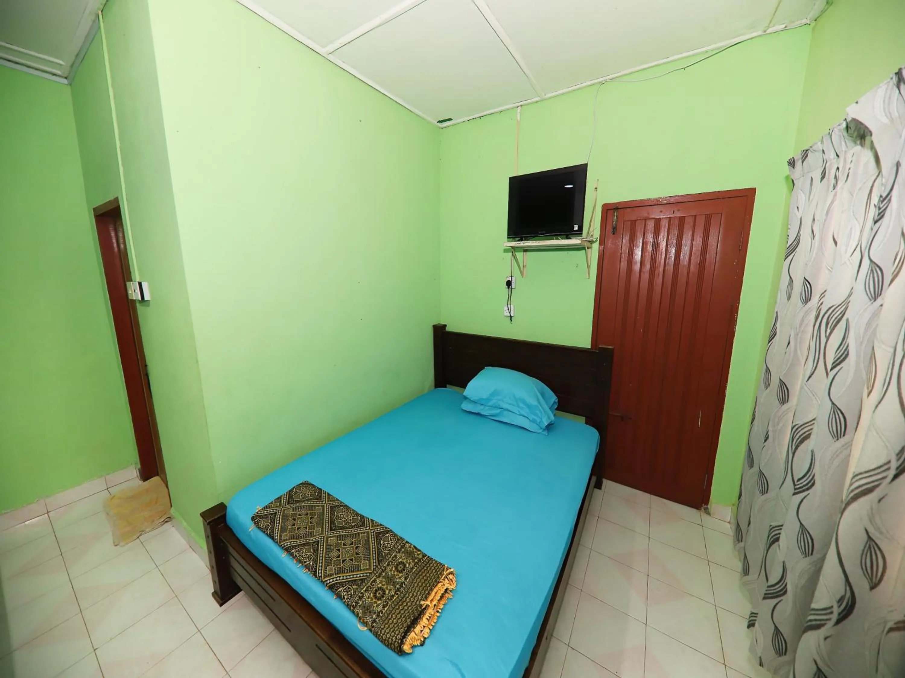 Bedroom in Hotel O Bayu Chalet