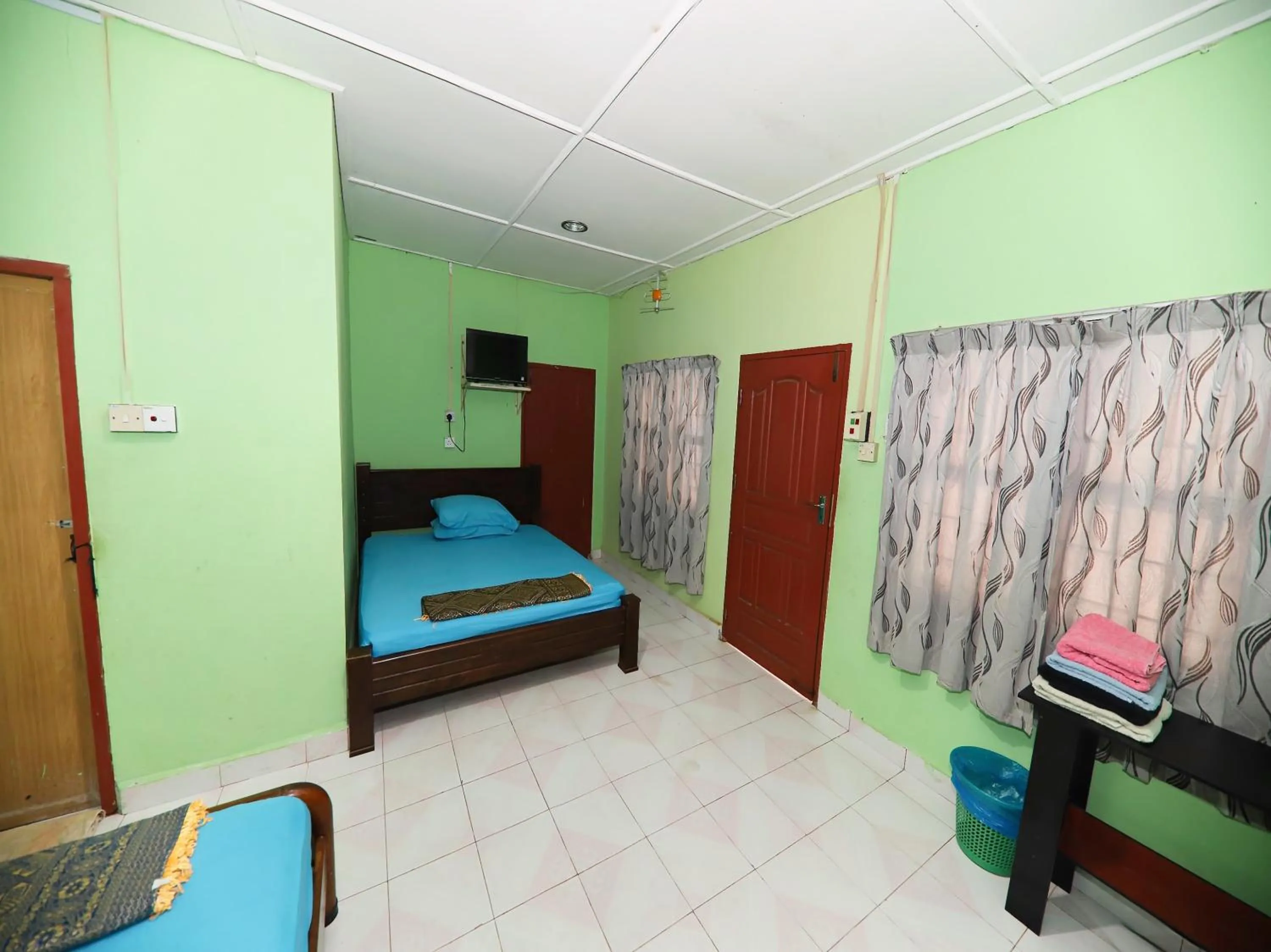 Bedroom in Hotel O Bayu Chalet