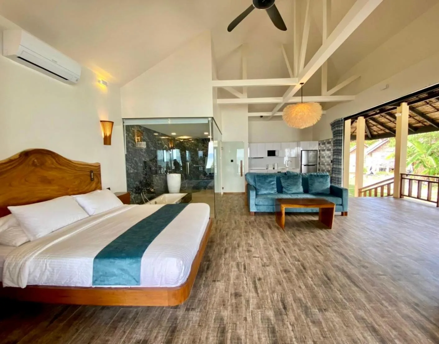 Bed in Absolute Beachfront Villas