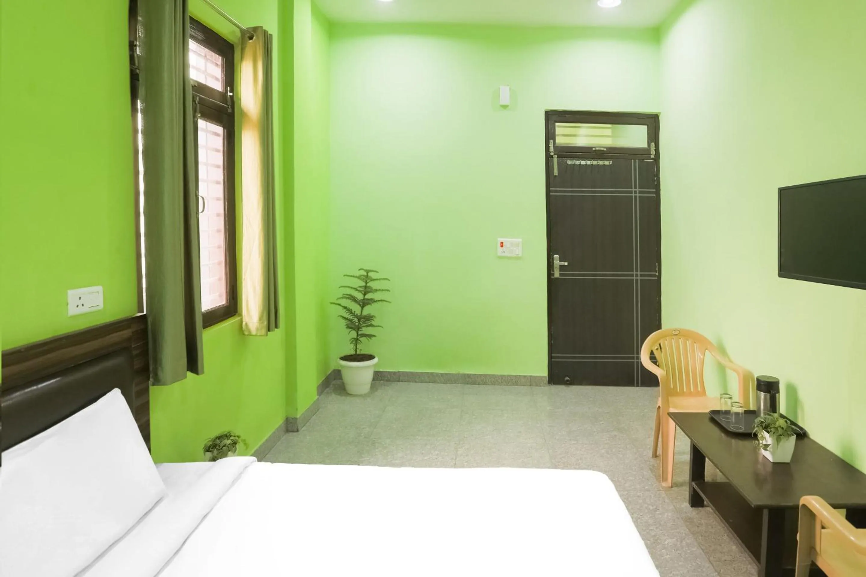 Bedroom in Capital O A-one