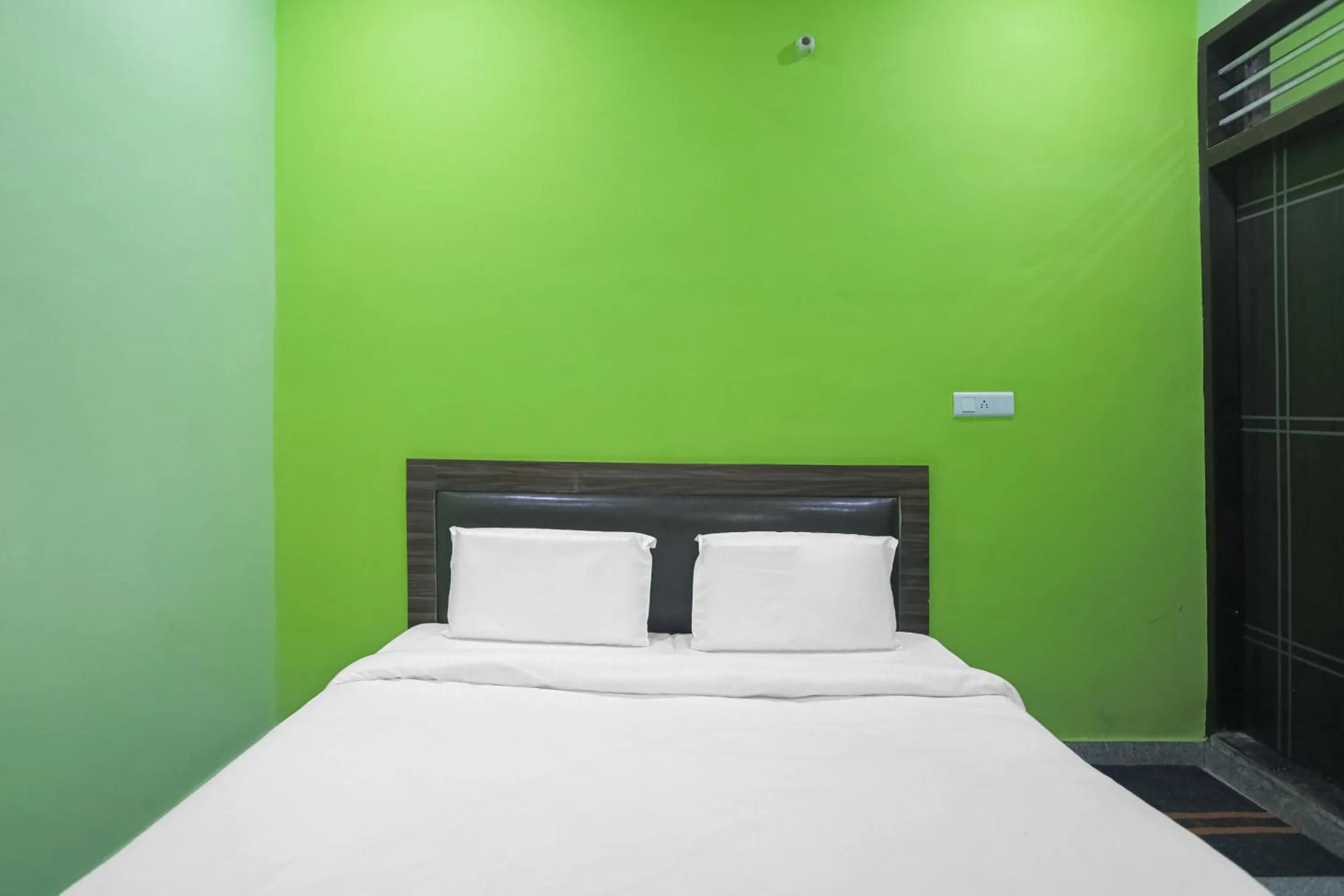 Bedroom in Capital O A-one