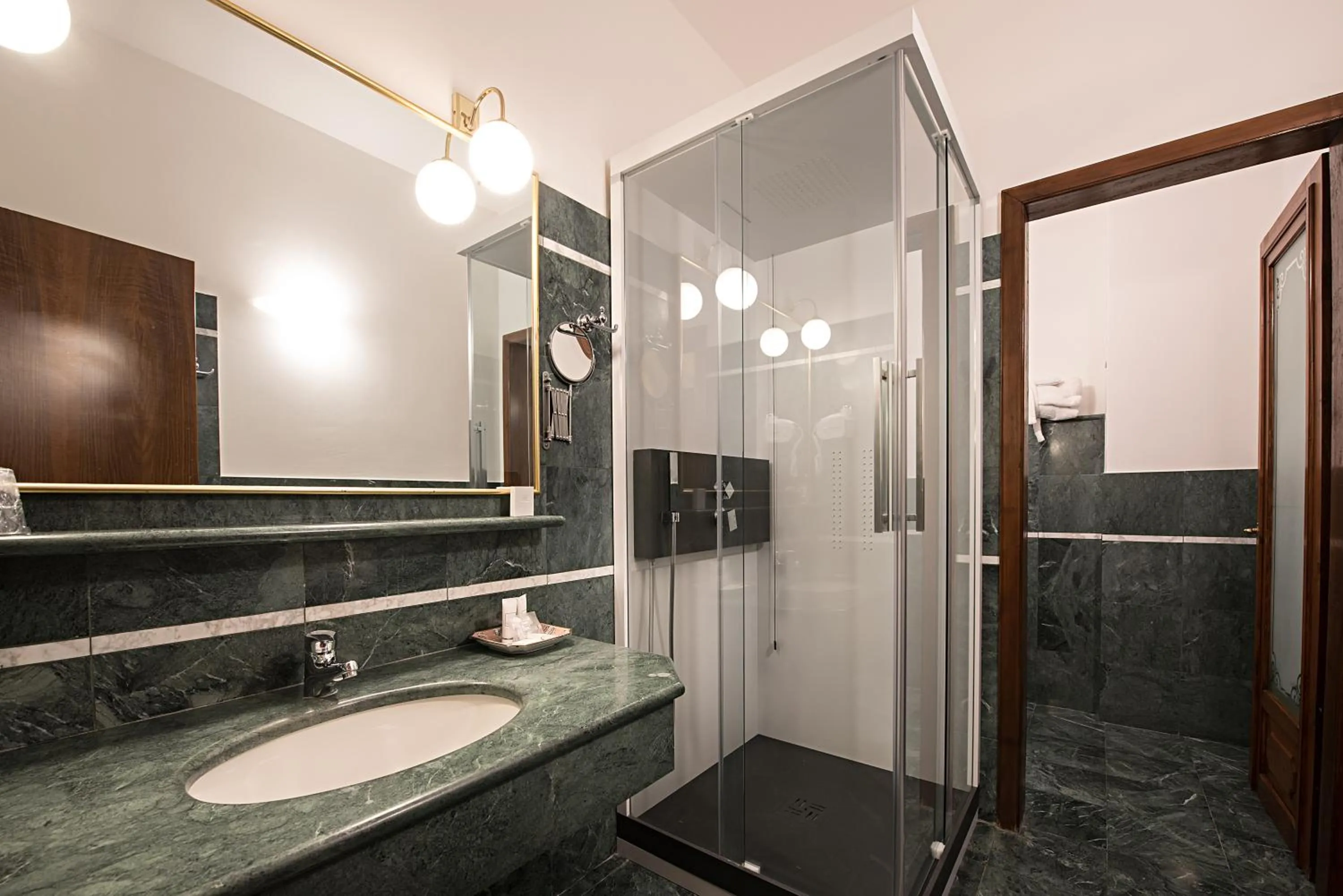 Bathroom in Best Western Plus Hotel Villa Tacchi