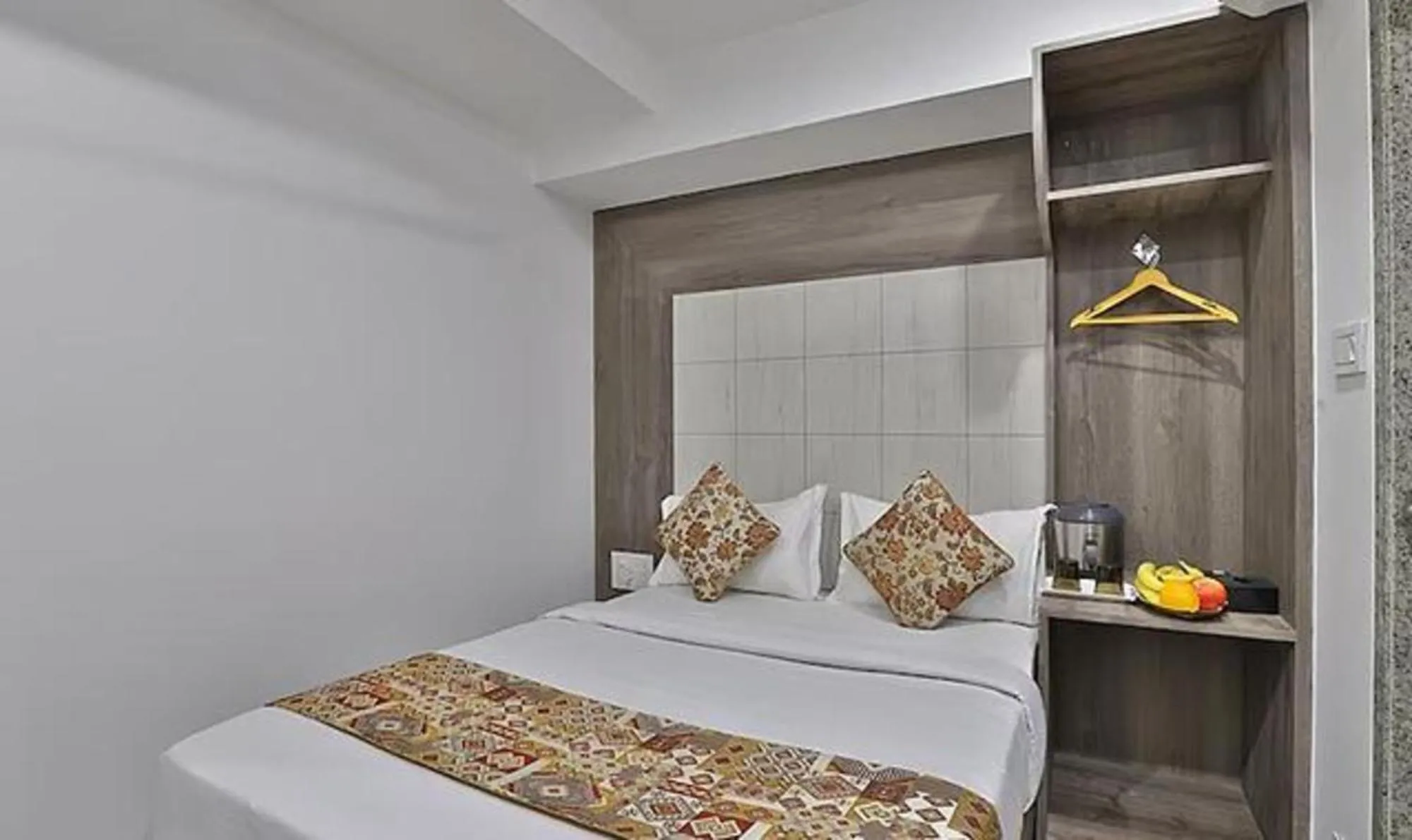 Bed in FabHotel Prime Legend