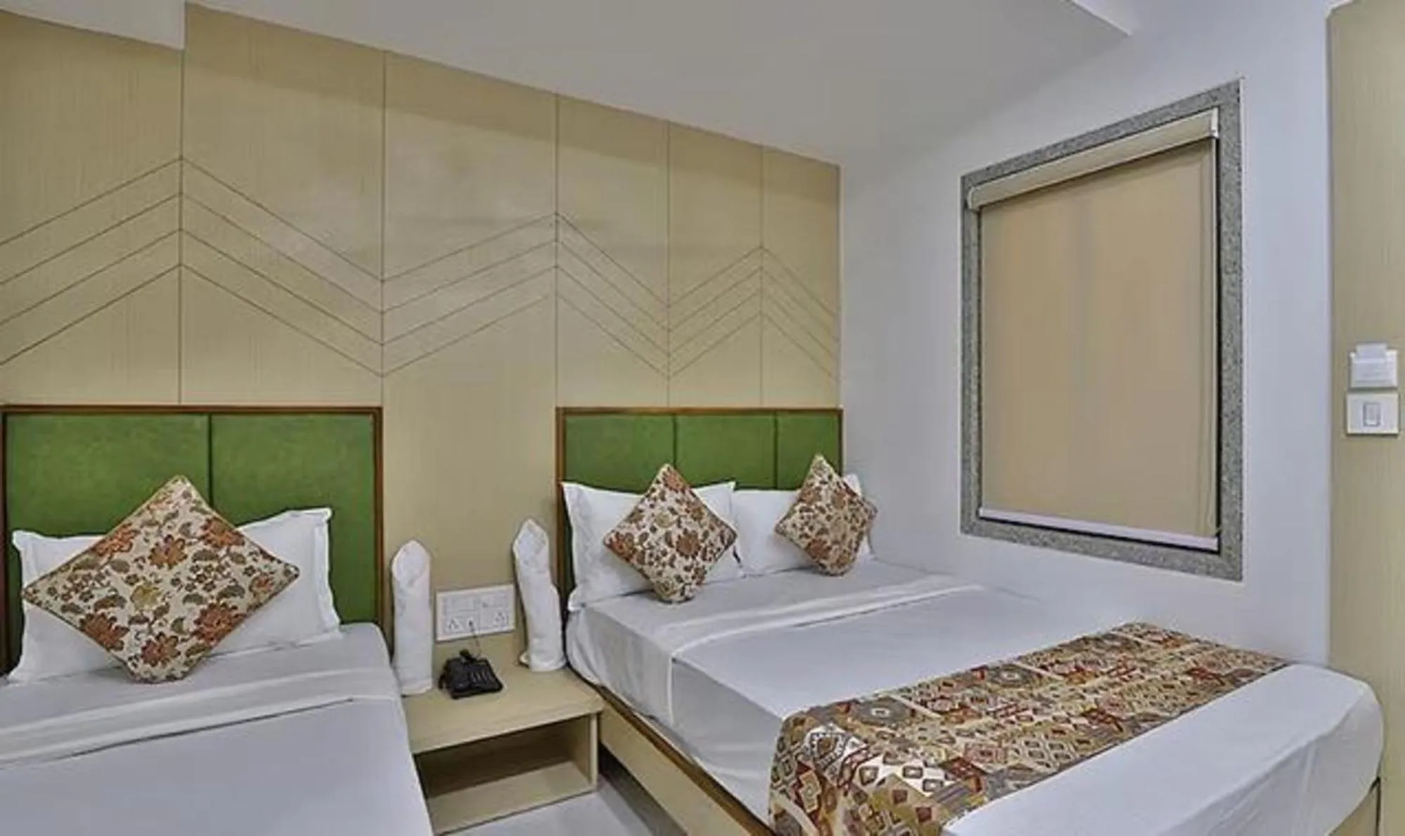 Bed in FabHotel Prime Legend