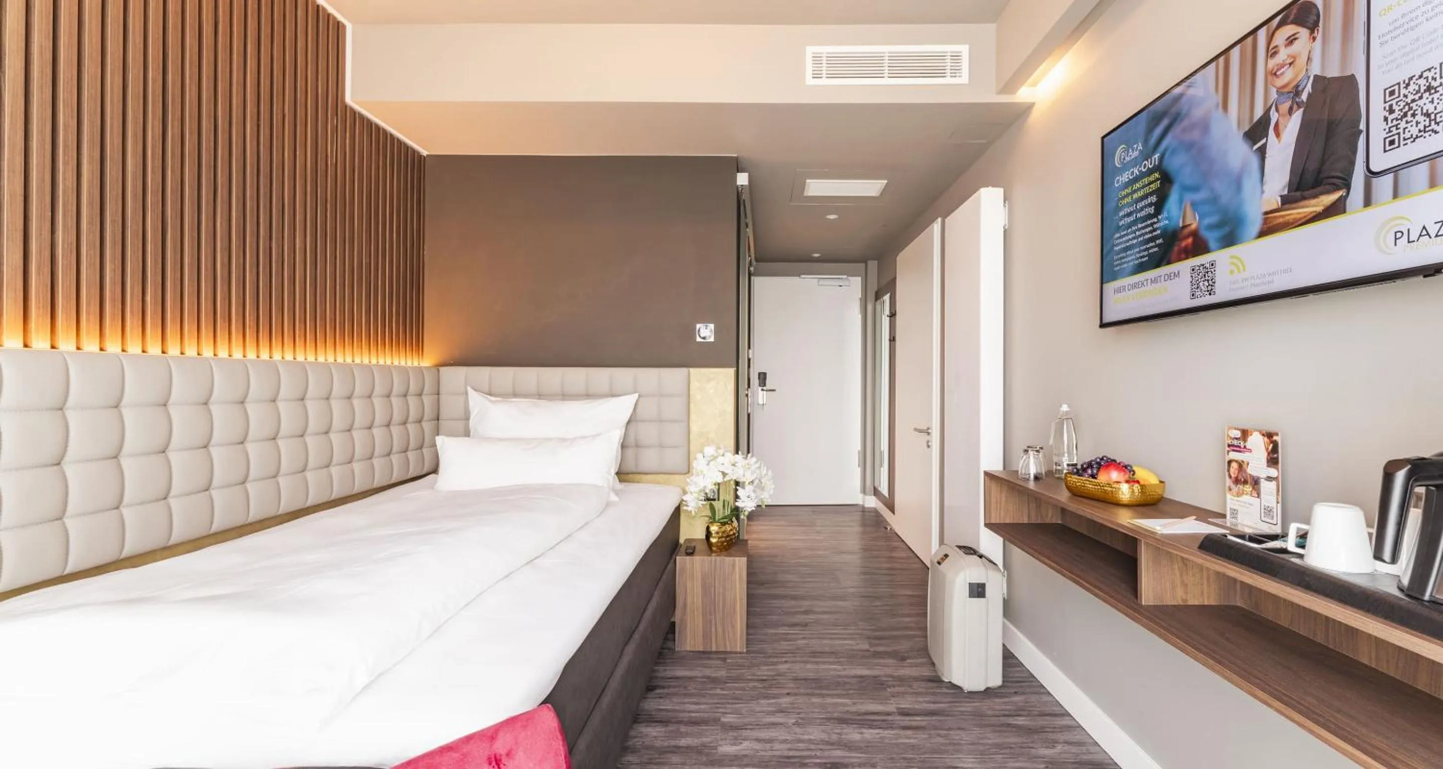 Photo of the whole room, Bed in PLAZA Premium Heidelberg