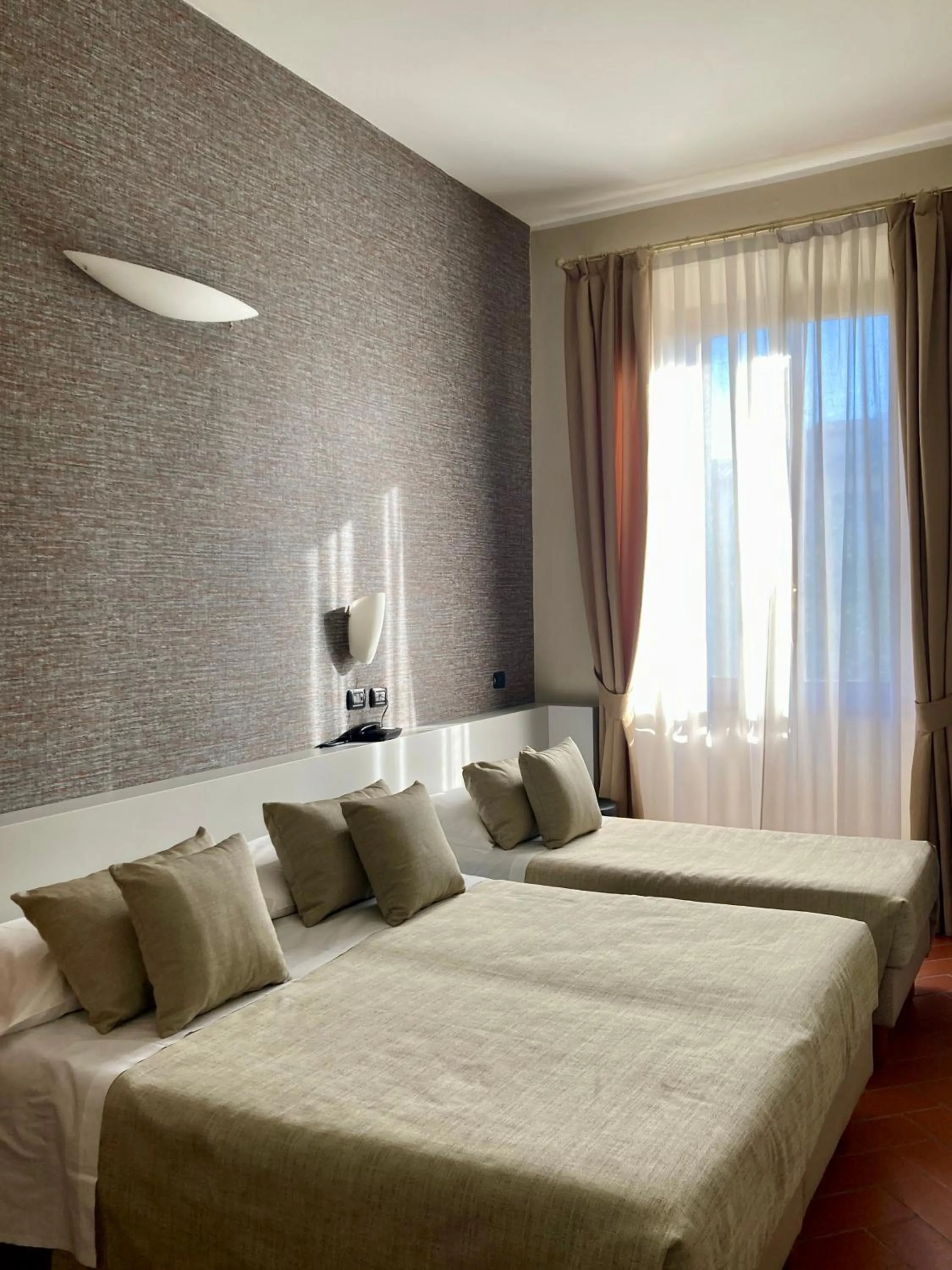 Bed in Hotel Caravaggio