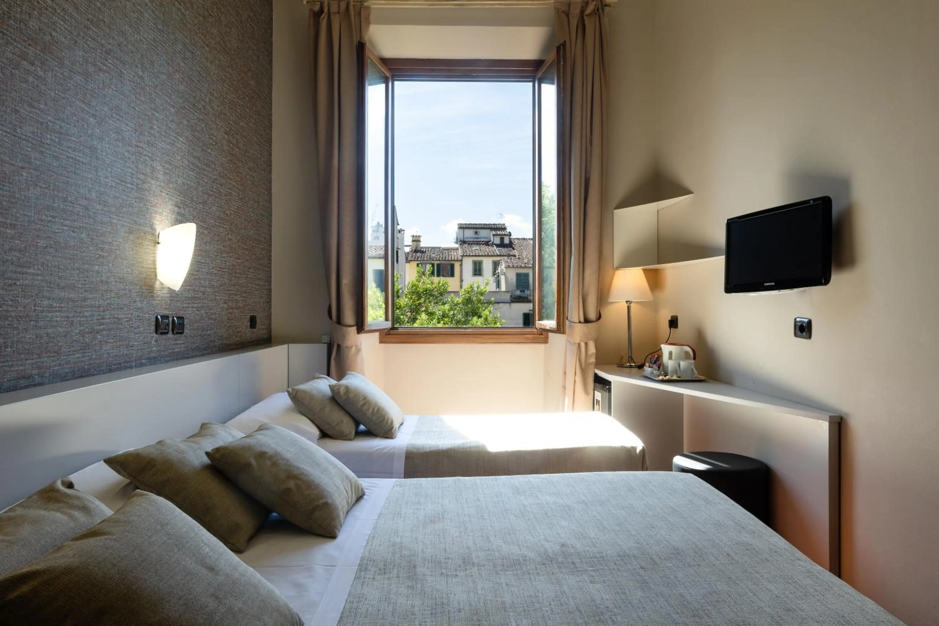 Bed in Hotel Caravaggio