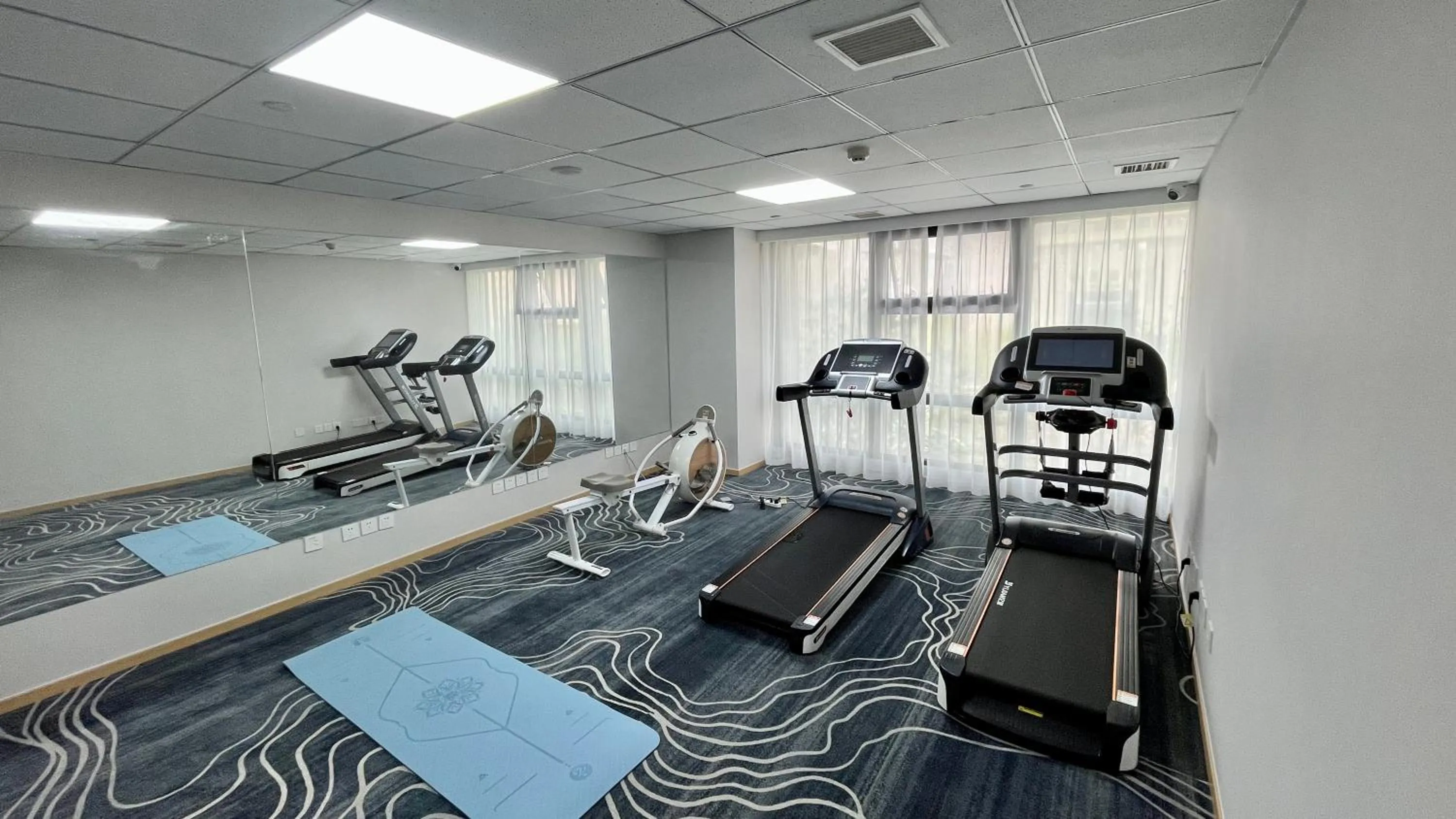 Fitness centre/facilities in Holiday Inn Express Qingdao City Center by IHG
