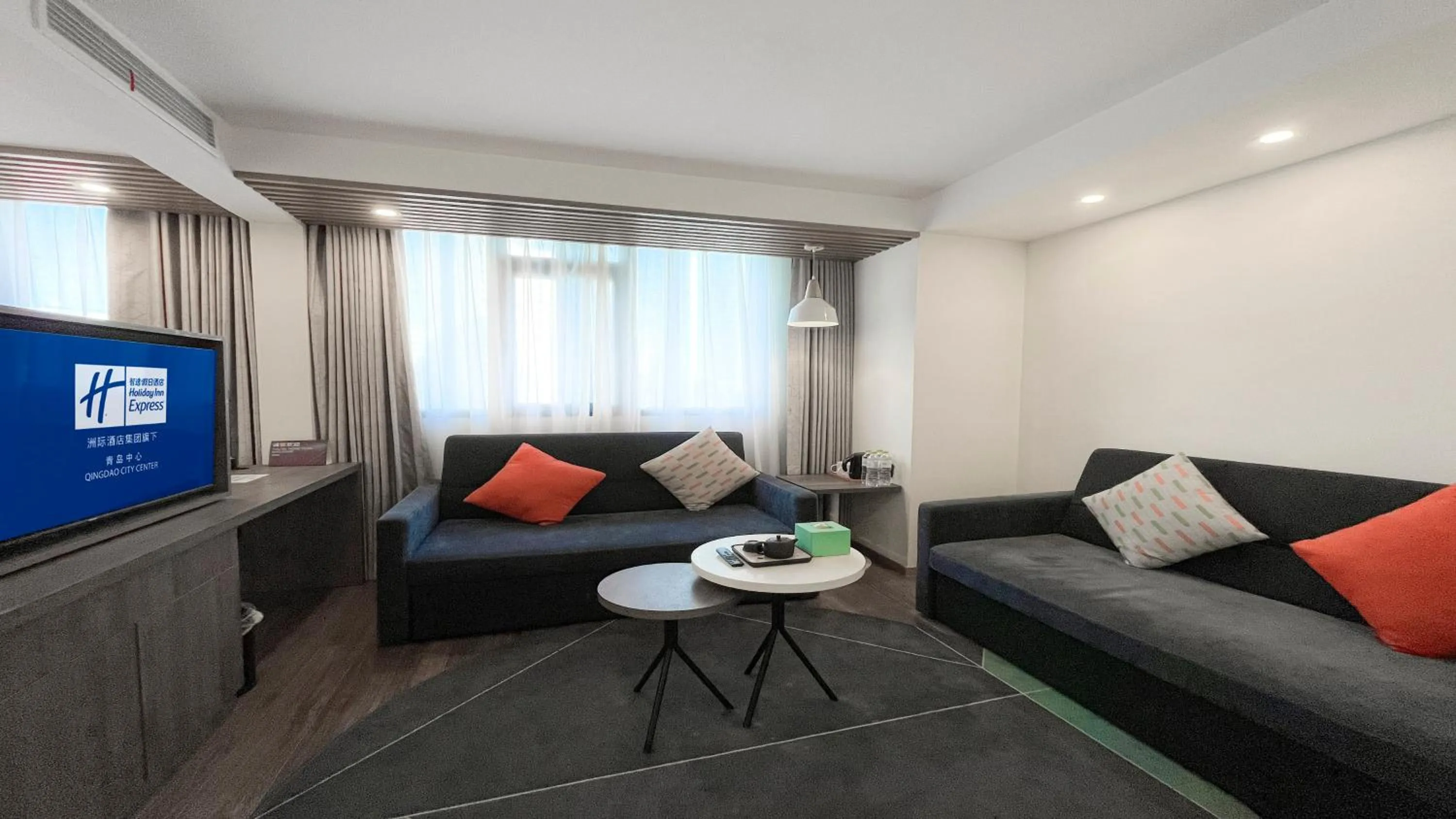 Bedroom in Holiday Inn Express Qingdao City Center by IHG