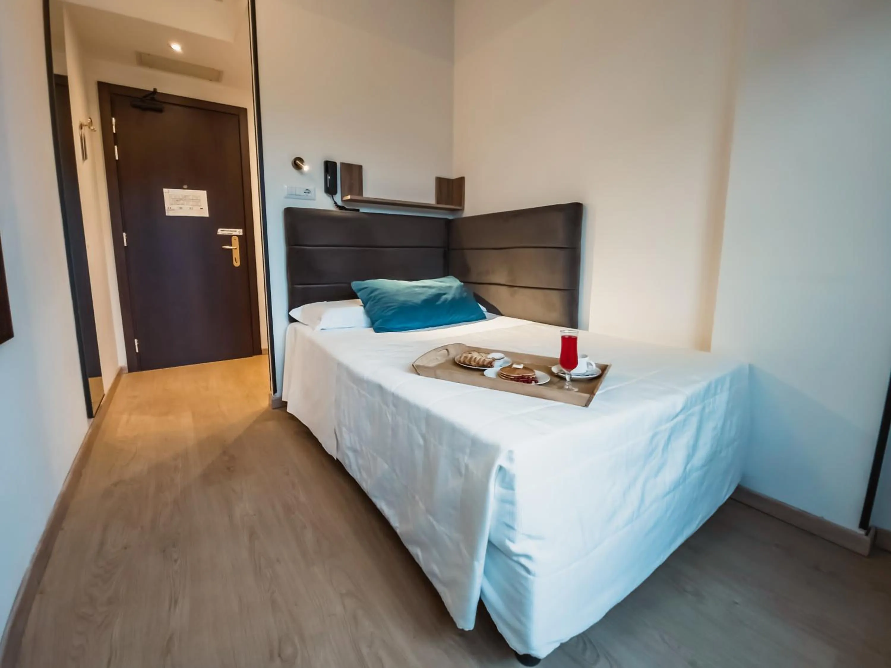 Bed in Art Hotel Milano