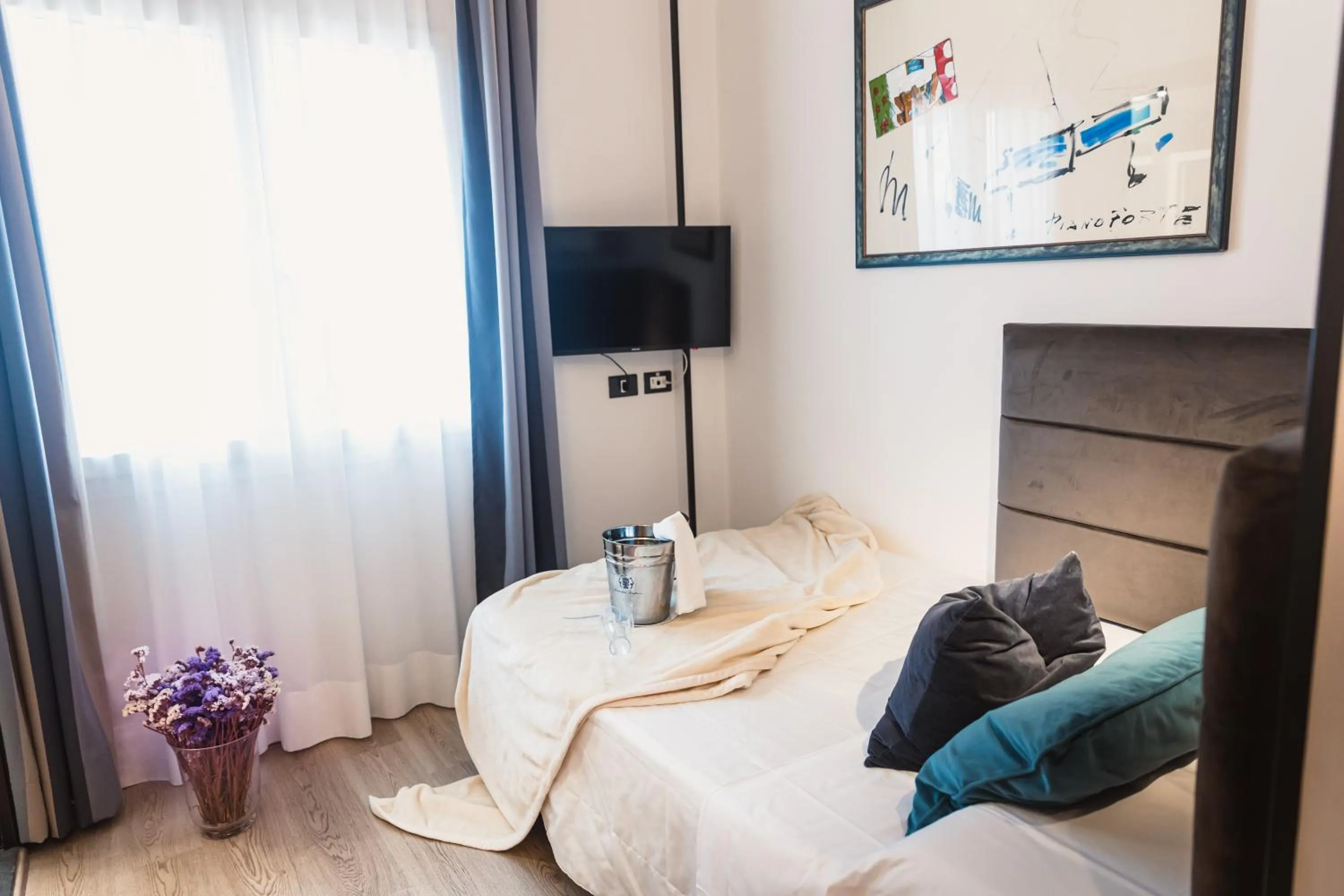 Bed in Art Hotel Milano