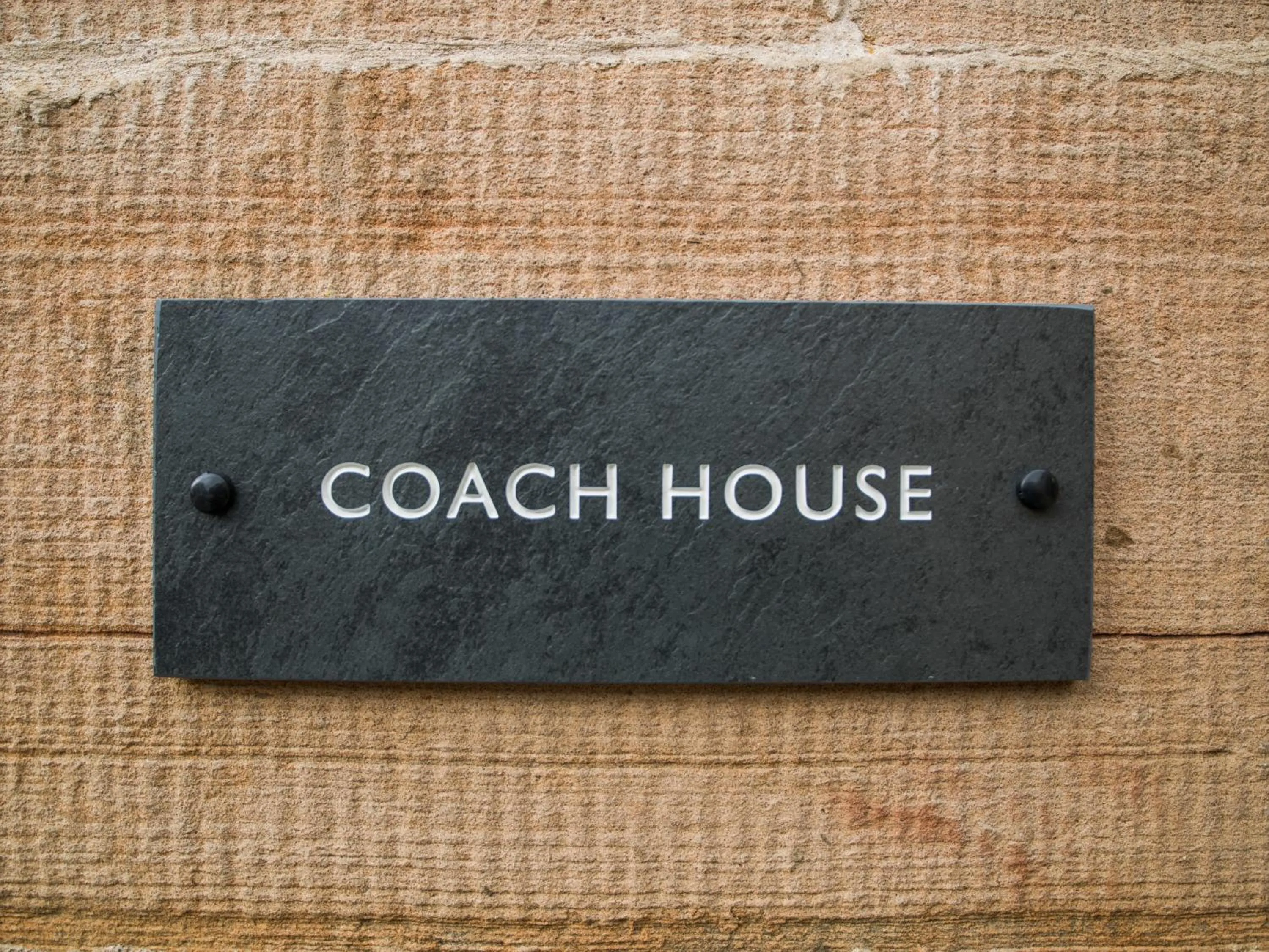Logo/Certificate/Sign in Coach House Ratho Park Steading
