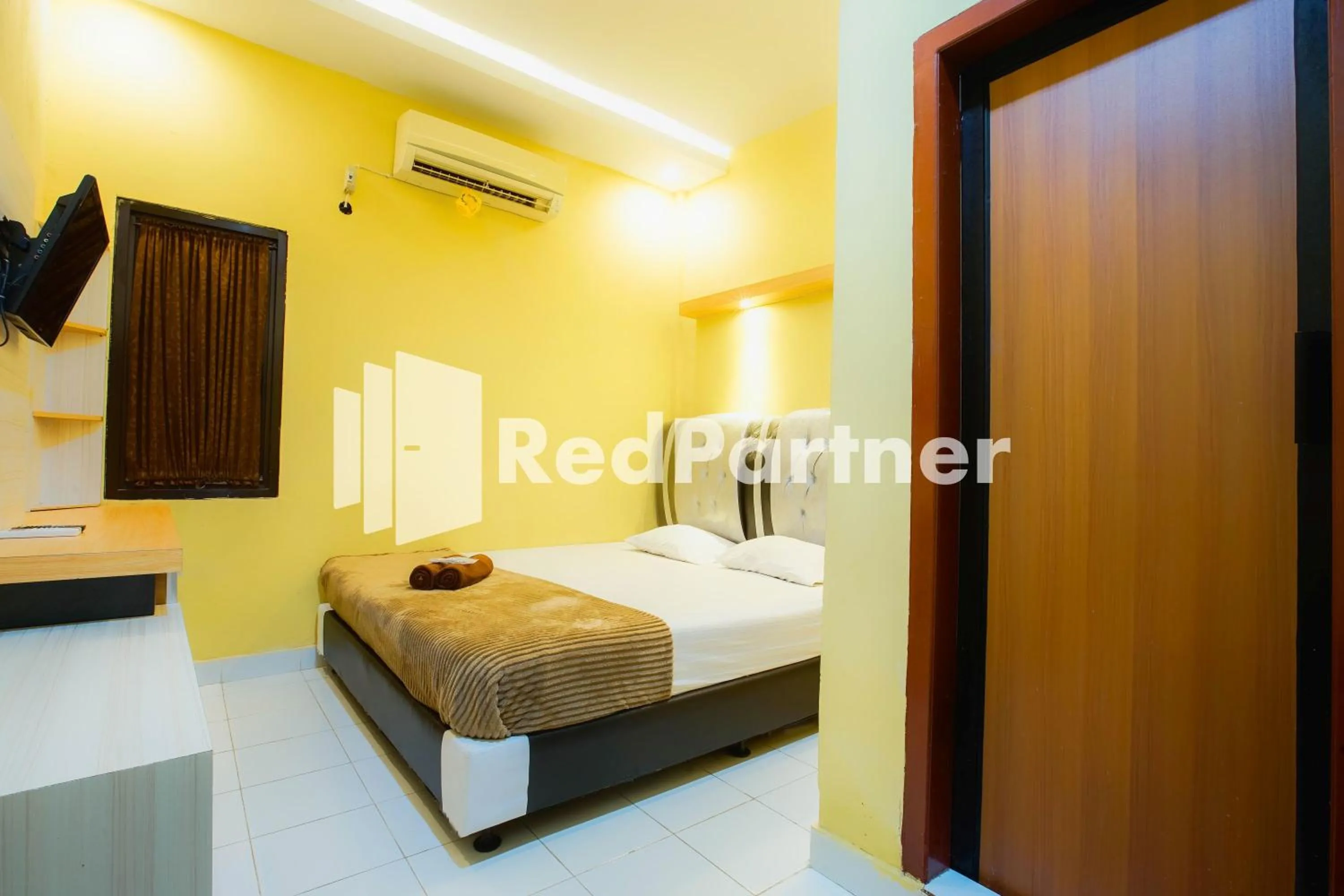 Bedroom, Bed in Hatta Guest House Syariah near Hayam Wuruk Jelutung Mitra RedDoorz