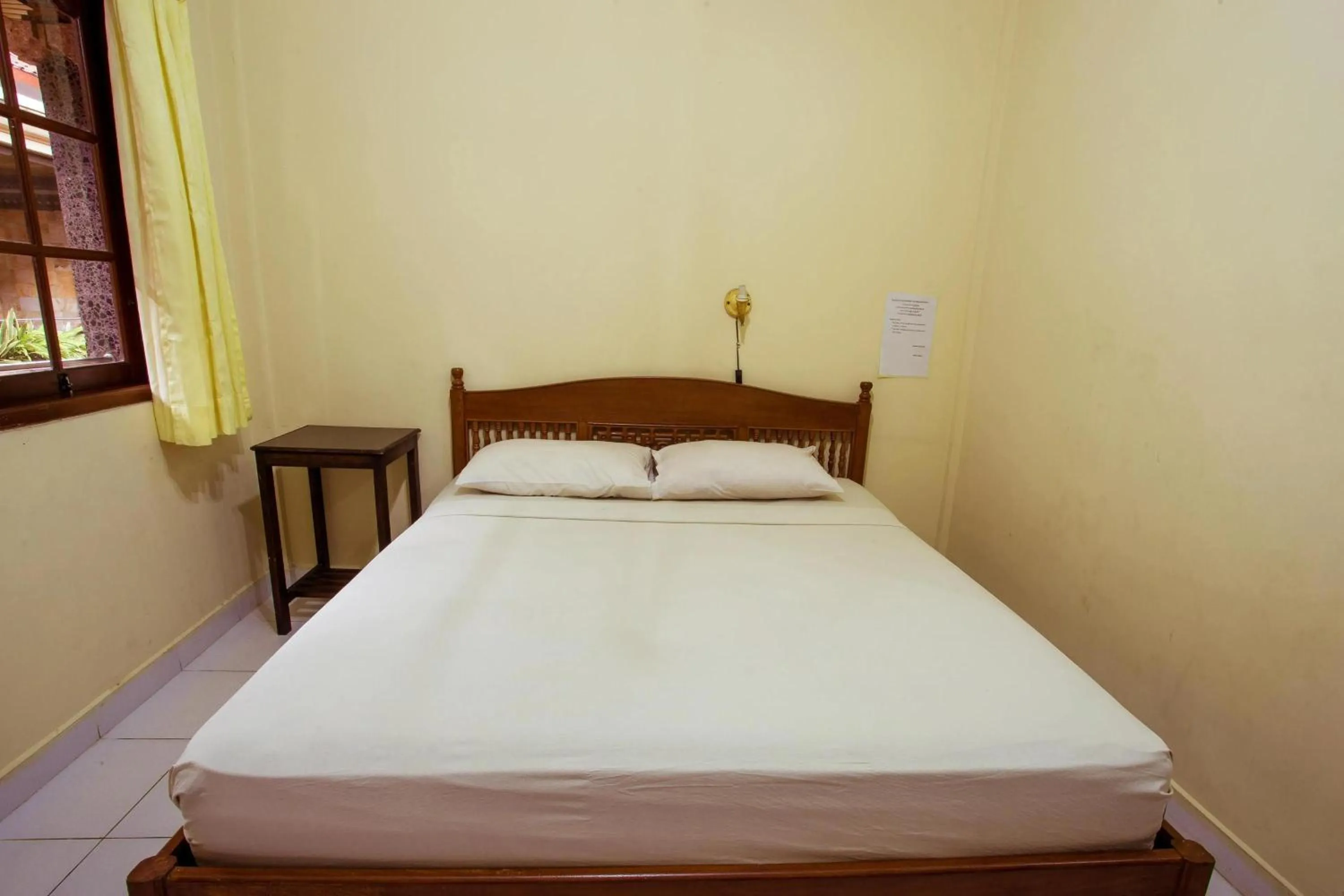 Bedroom, Bed in Segara Sadhu Inn Kuta by ecommerceloka