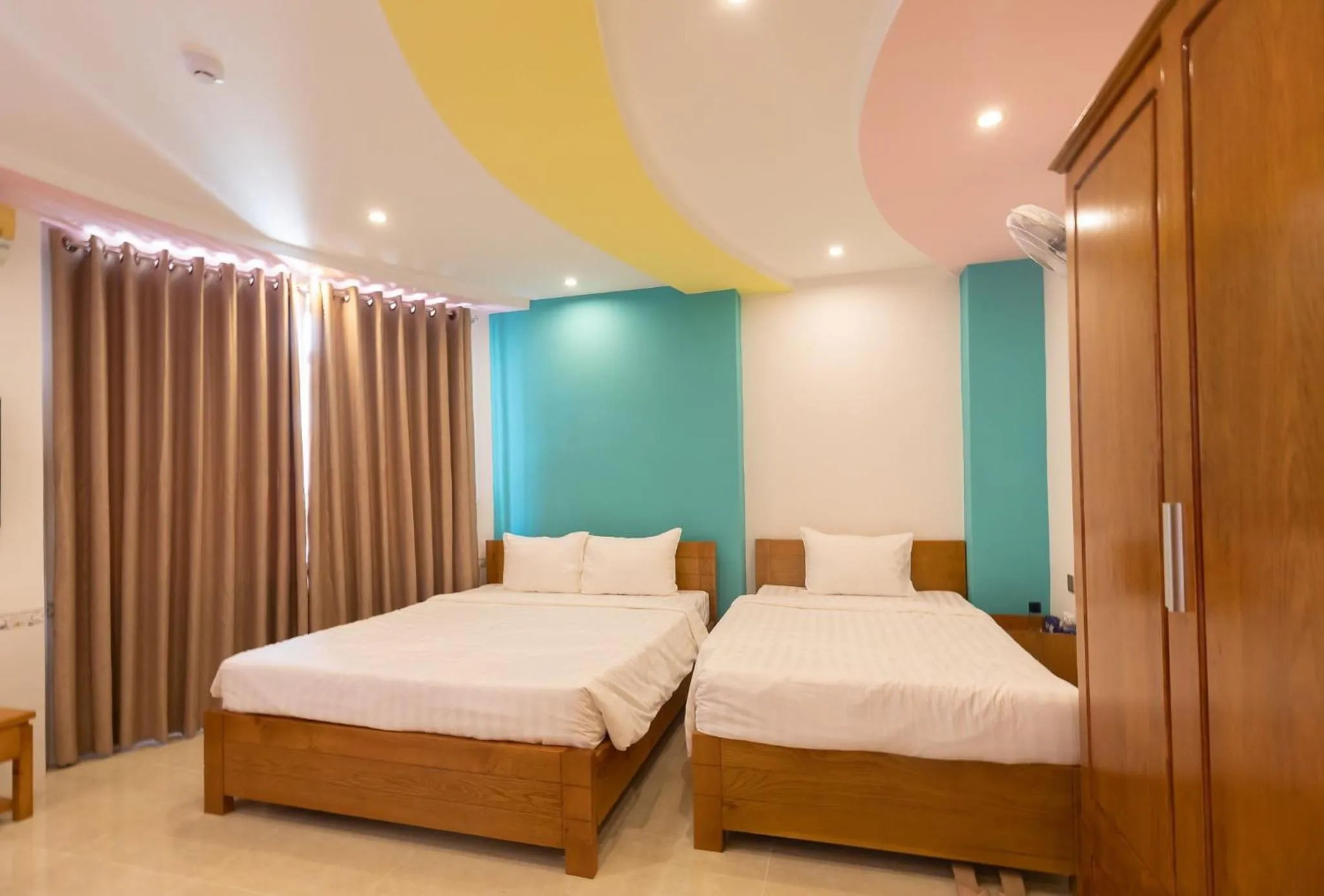 Bed in 26 Topaz Hotel