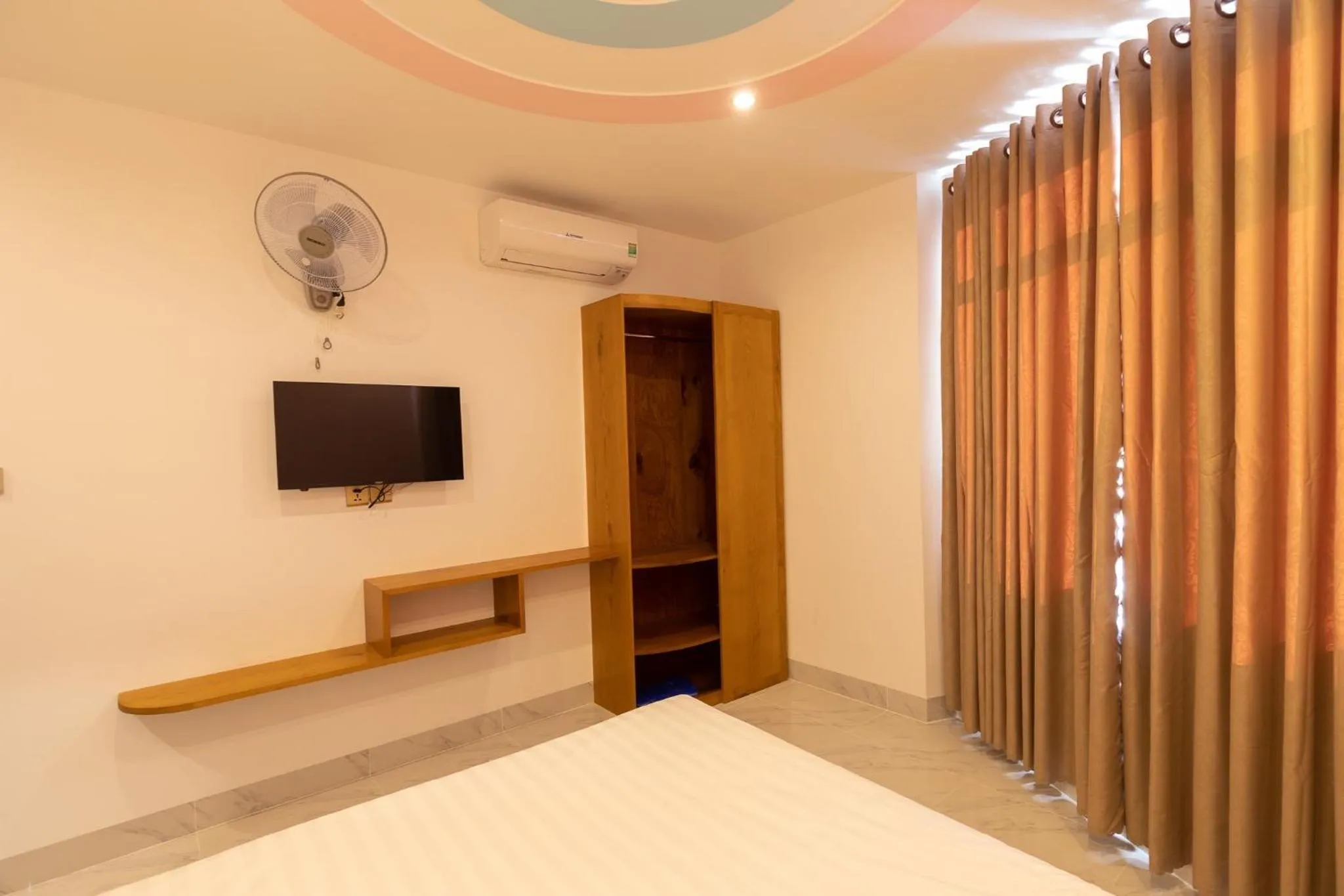 Bed in 26 Topaz Hotel