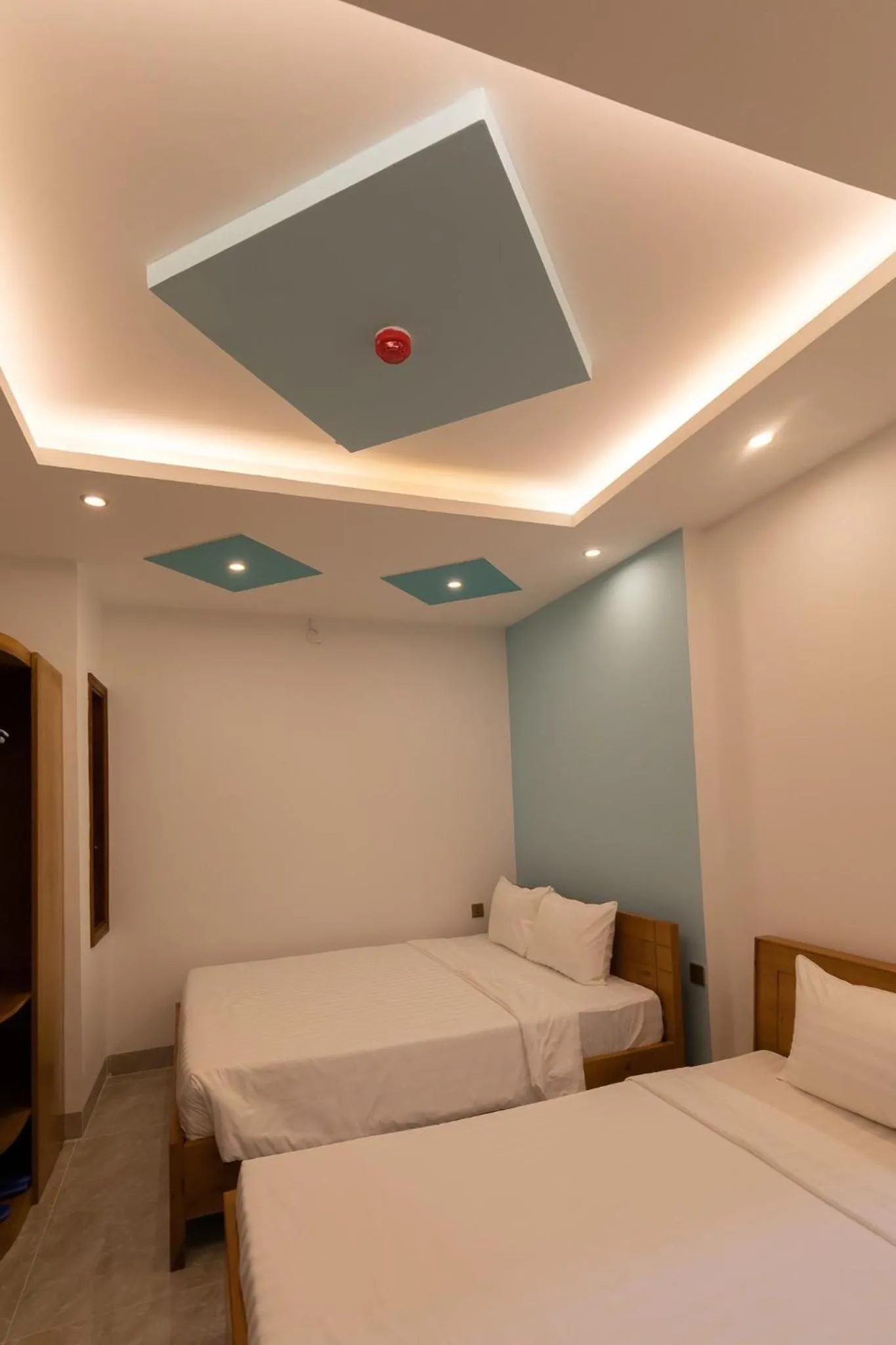 Bed in 26 Topaz Hotel