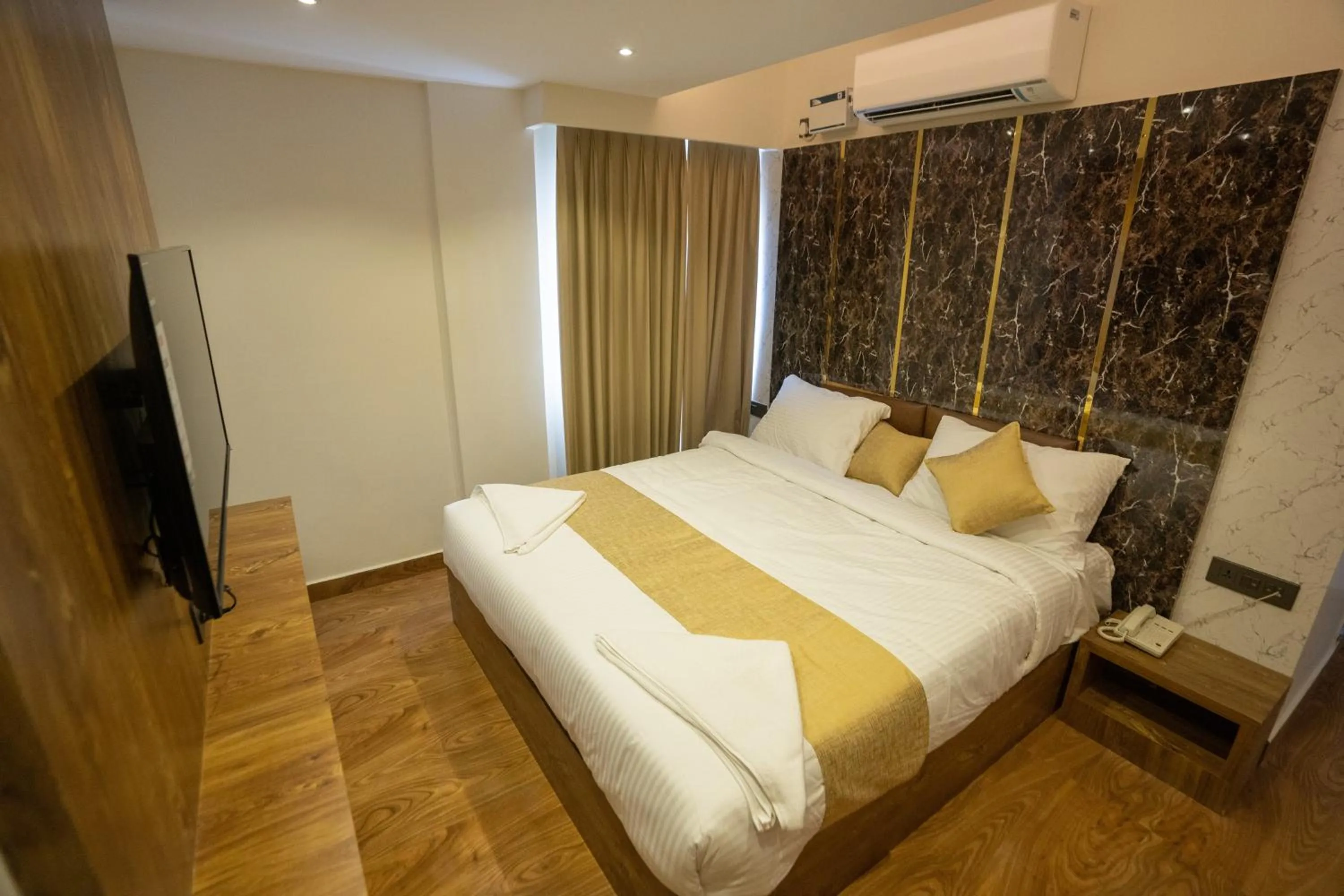 Photo of the whole room, Bed in Clarks Inn , Airport Bangalore