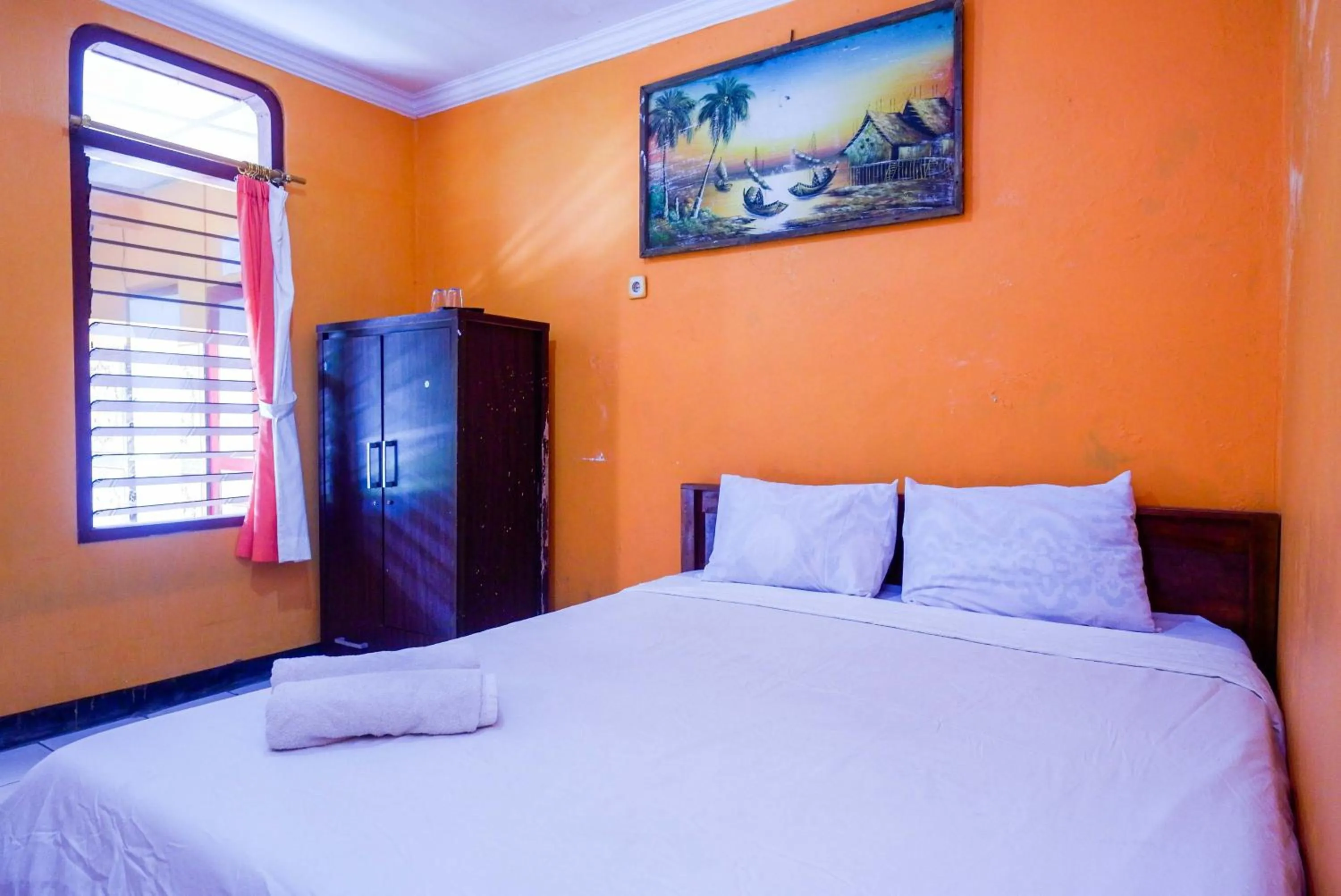 Bedroom, Bed in Hotel Widodo 1 Parangtritis RedPartner
