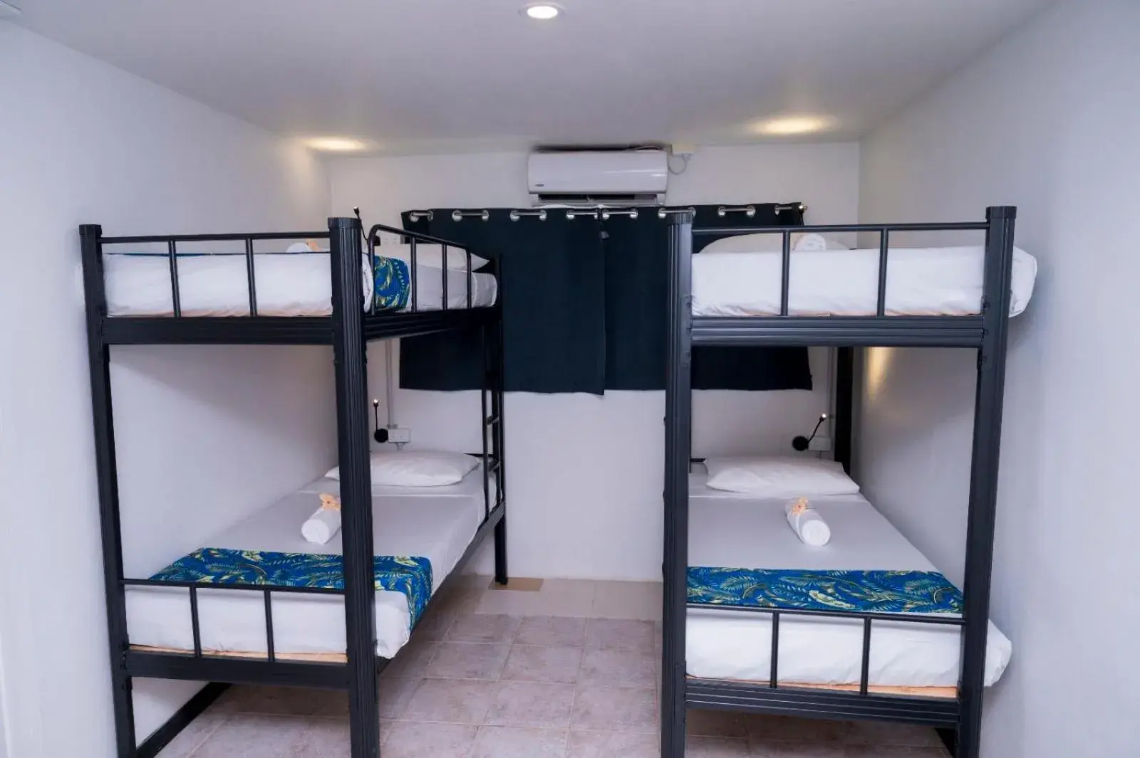 Bunk Bed in Male Dormitory Room in Sailors Beach Fiji Bunk Bed in Male Dormitory Room in Sailors Beach Fiji