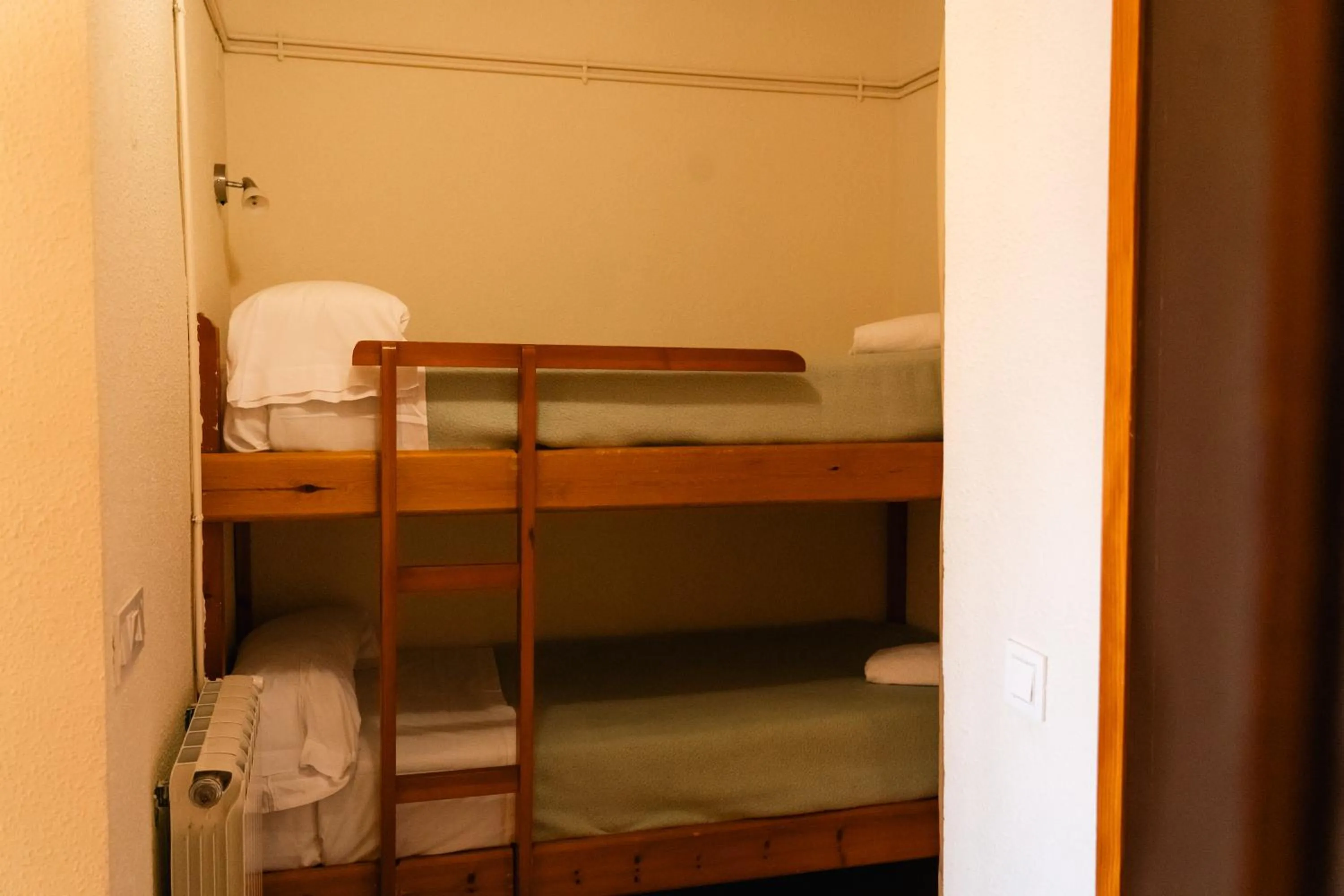 Bed in Apartamentos SNÖ Edelweiss