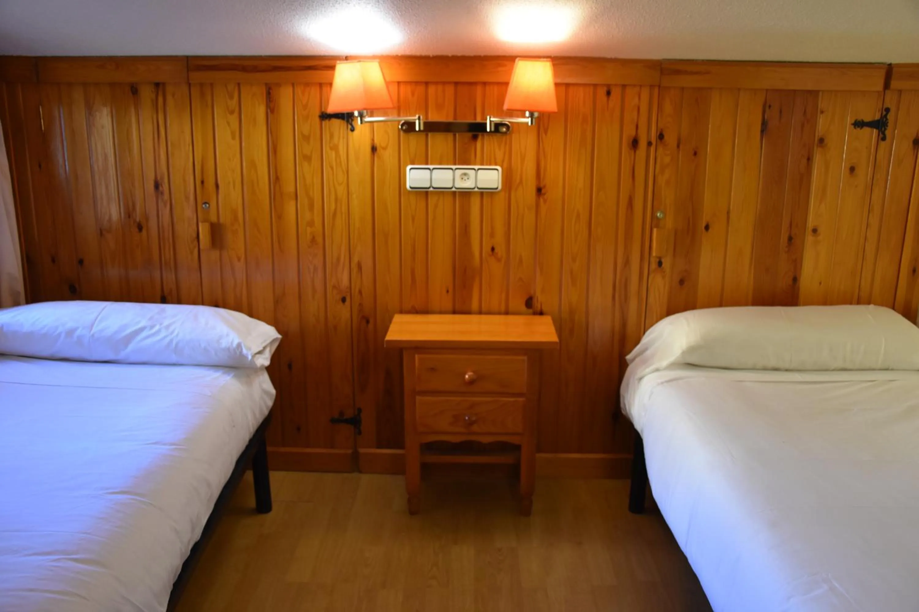 Bed in Apartamentos SNÖ Edelweiss