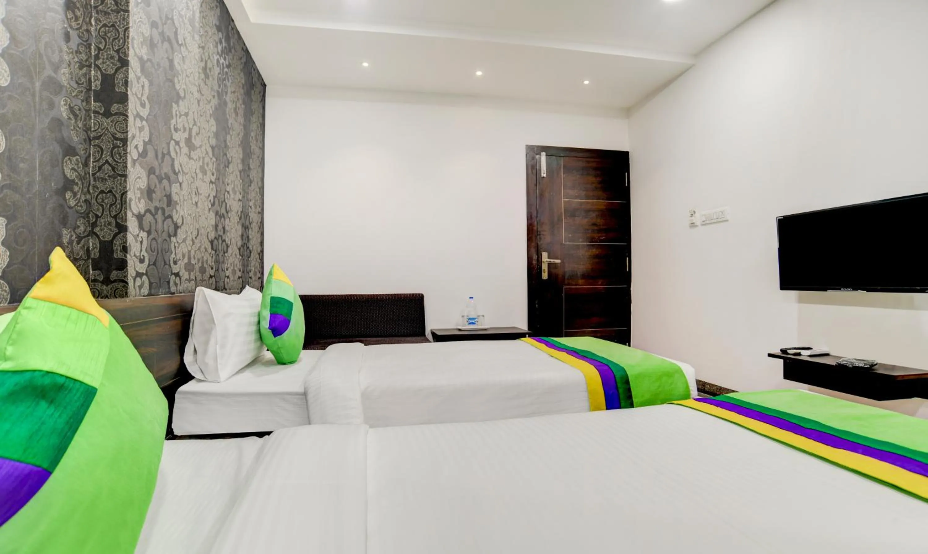 Bedroom, Bed in Treebo Grand Euro Pipliyahana Square