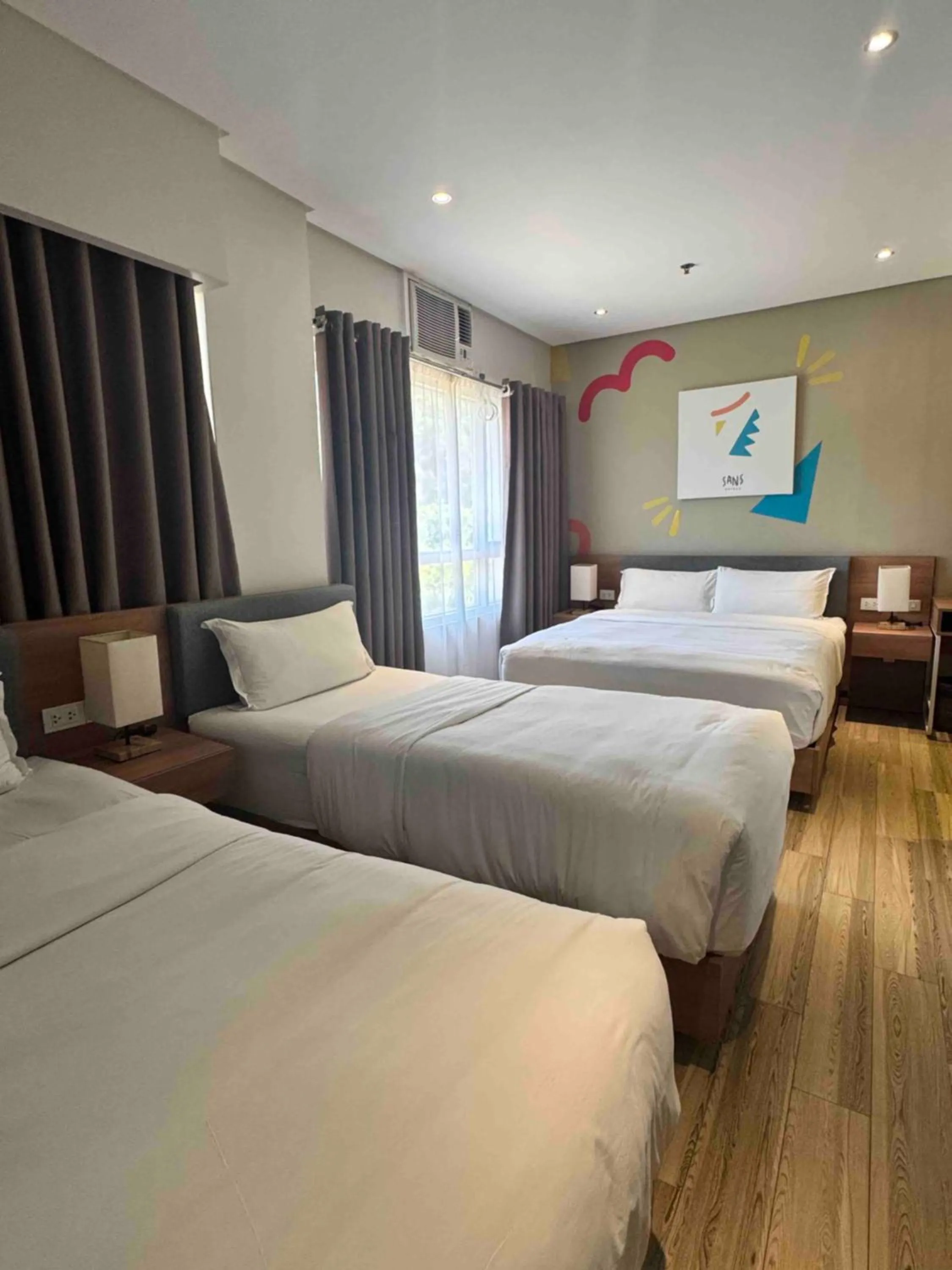 Bed in Luxebridge Hotel