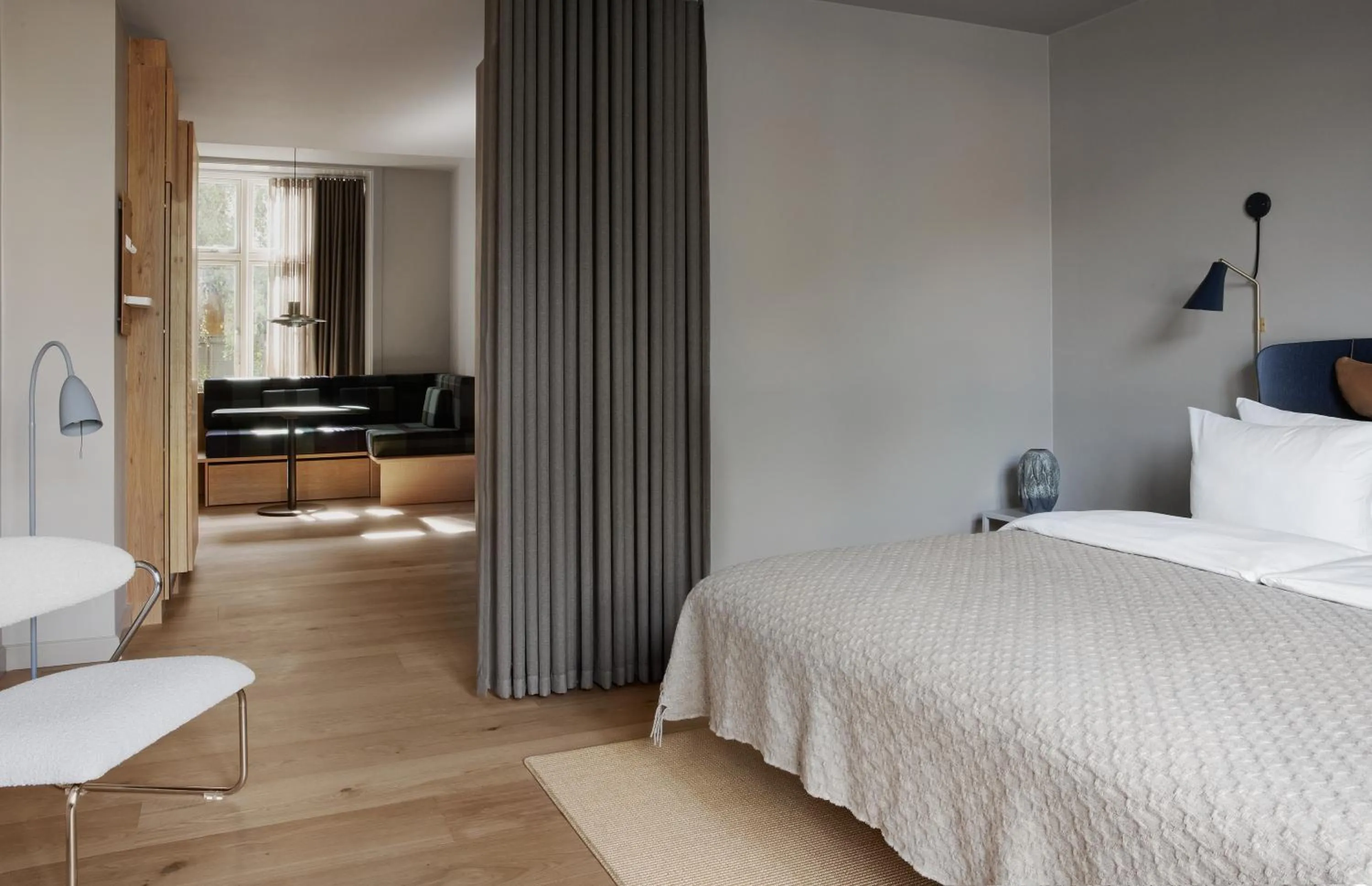 Bed in Apartments by Brøchner Hotels