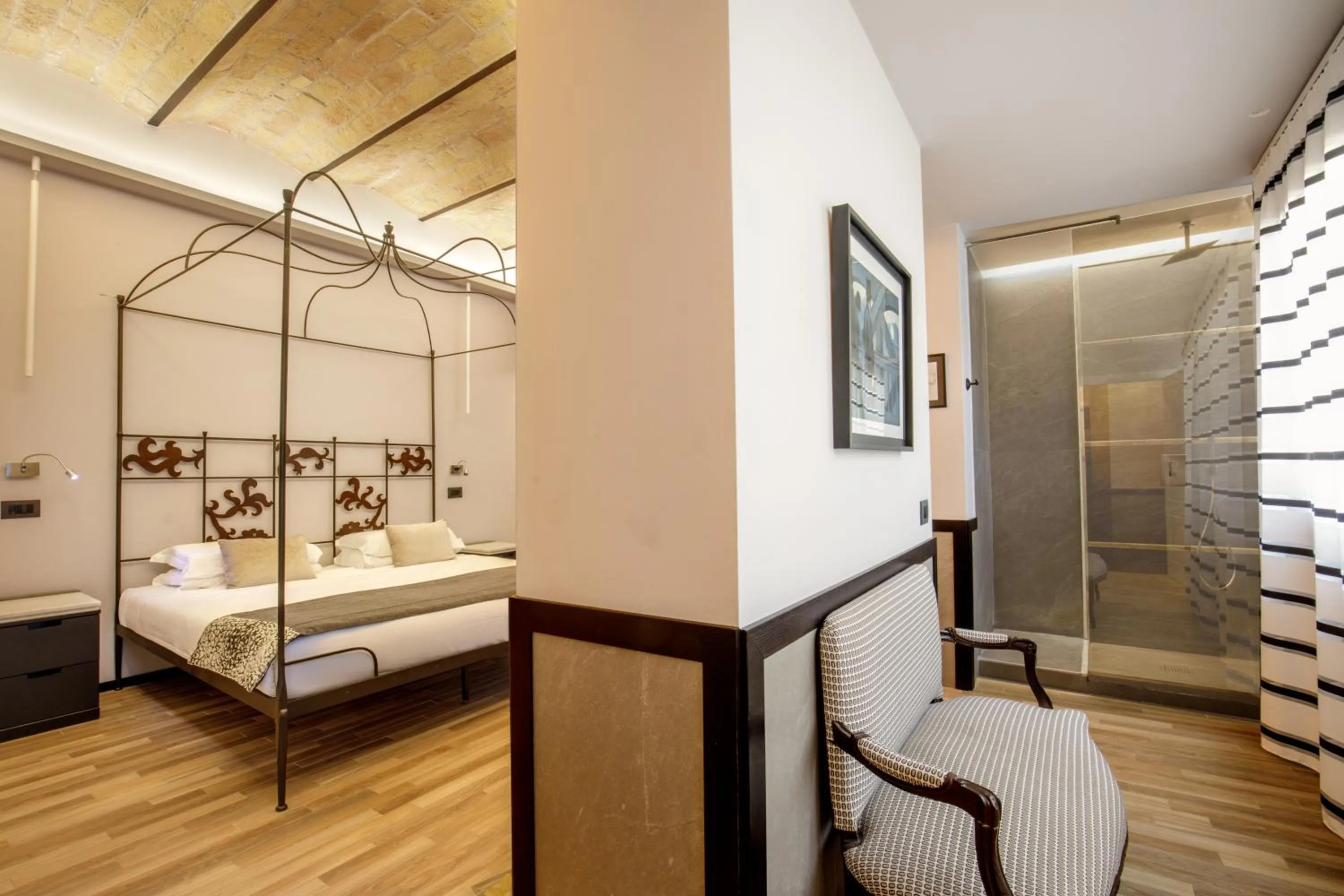 Bed in Flâneur Suites Corso