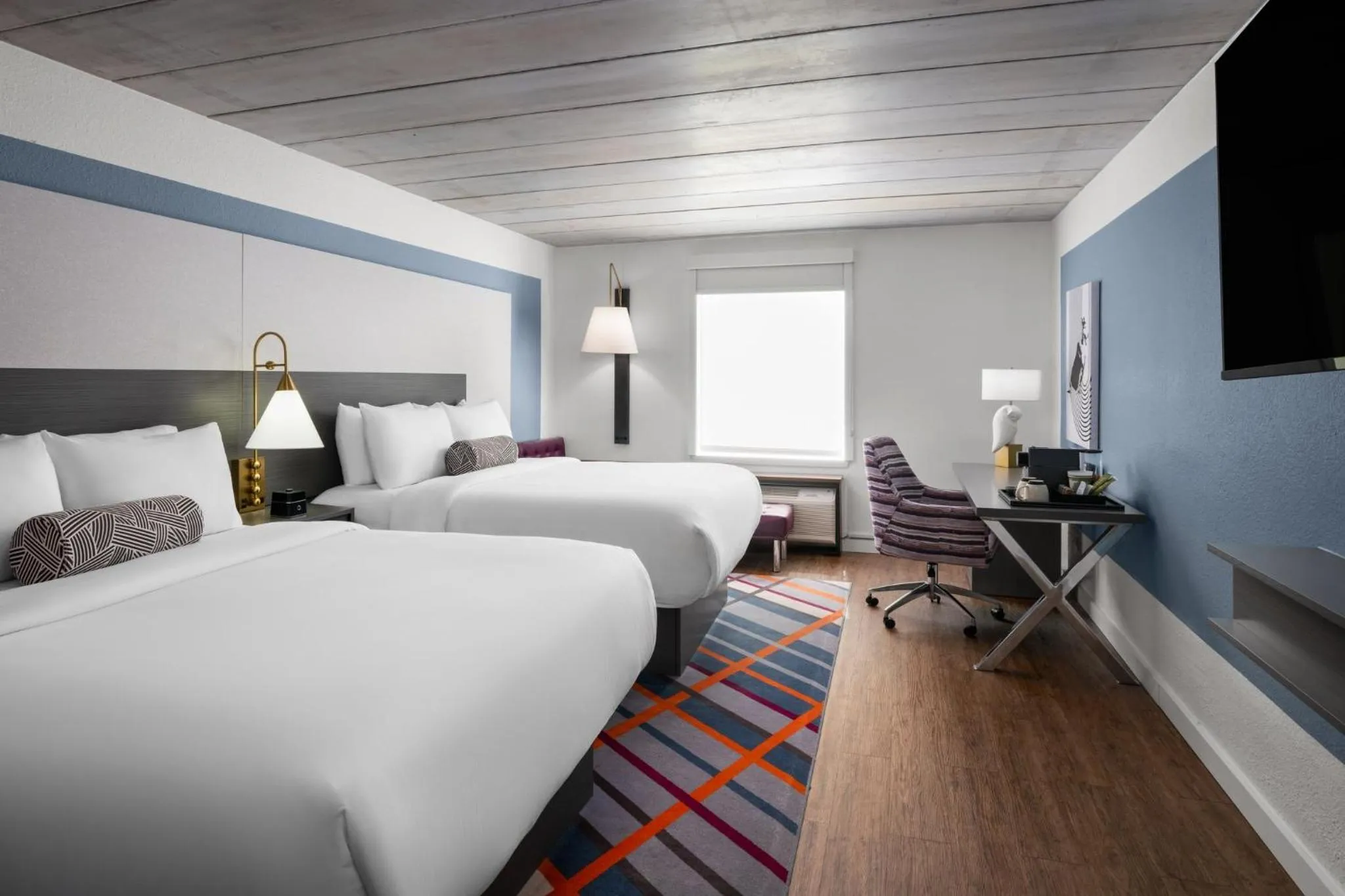 Photo of the whole room, Bed in voco College Station Aggieland by IHG