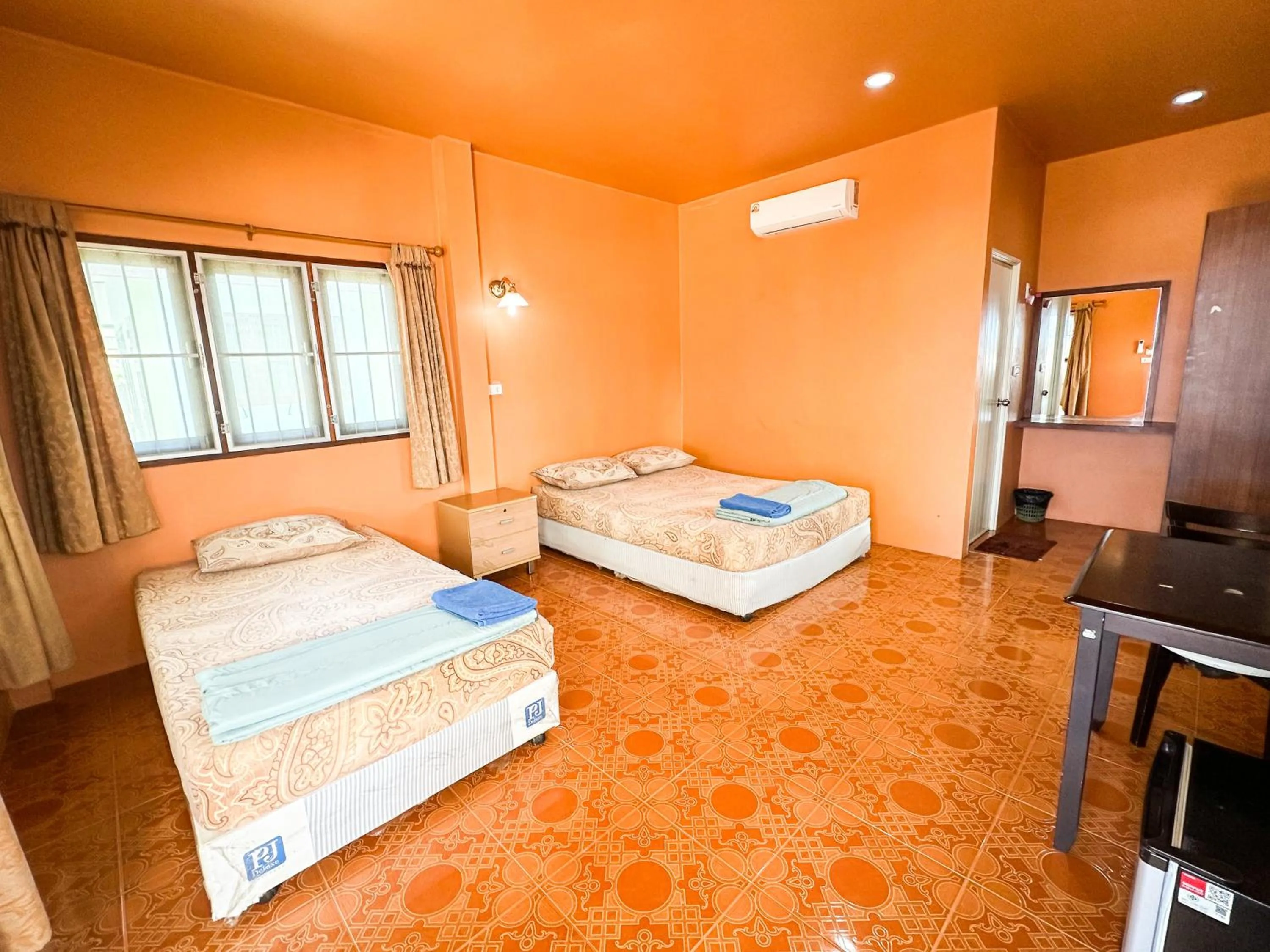 Bed in O'chai Bungalows