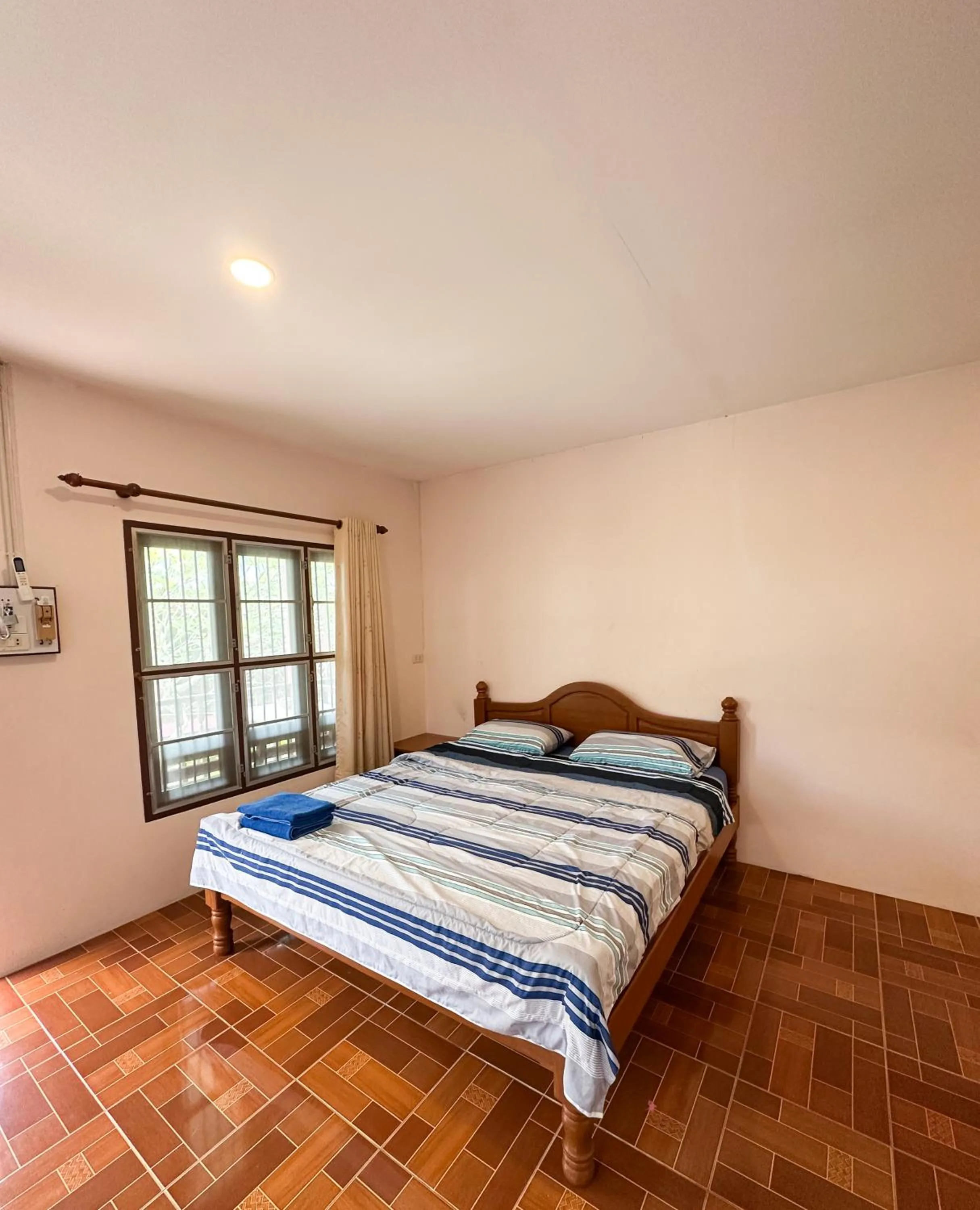 Bed in O'chai Bungalows