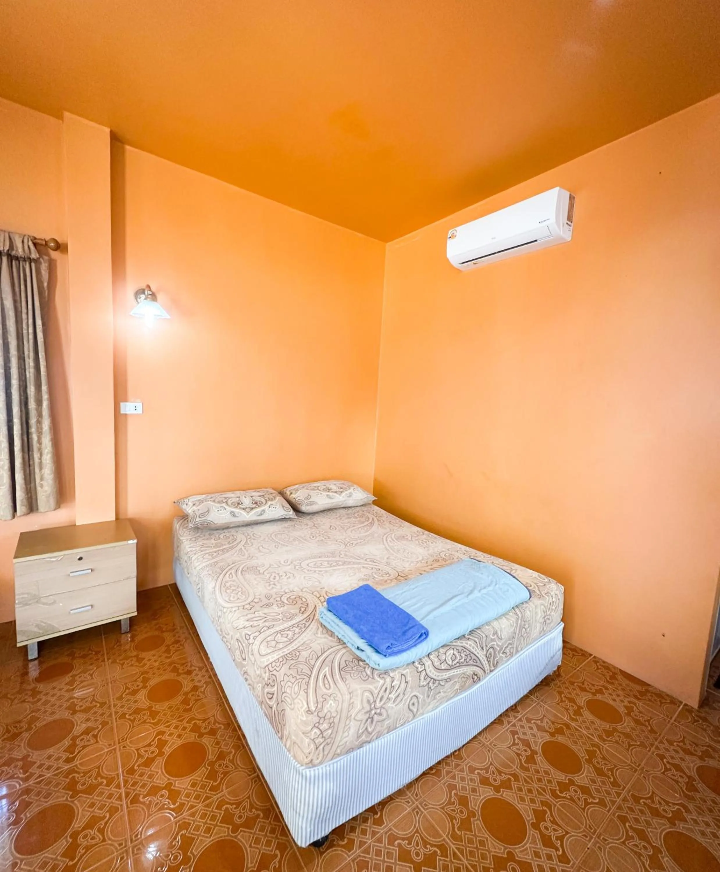 Bed in O'chai Bungalows