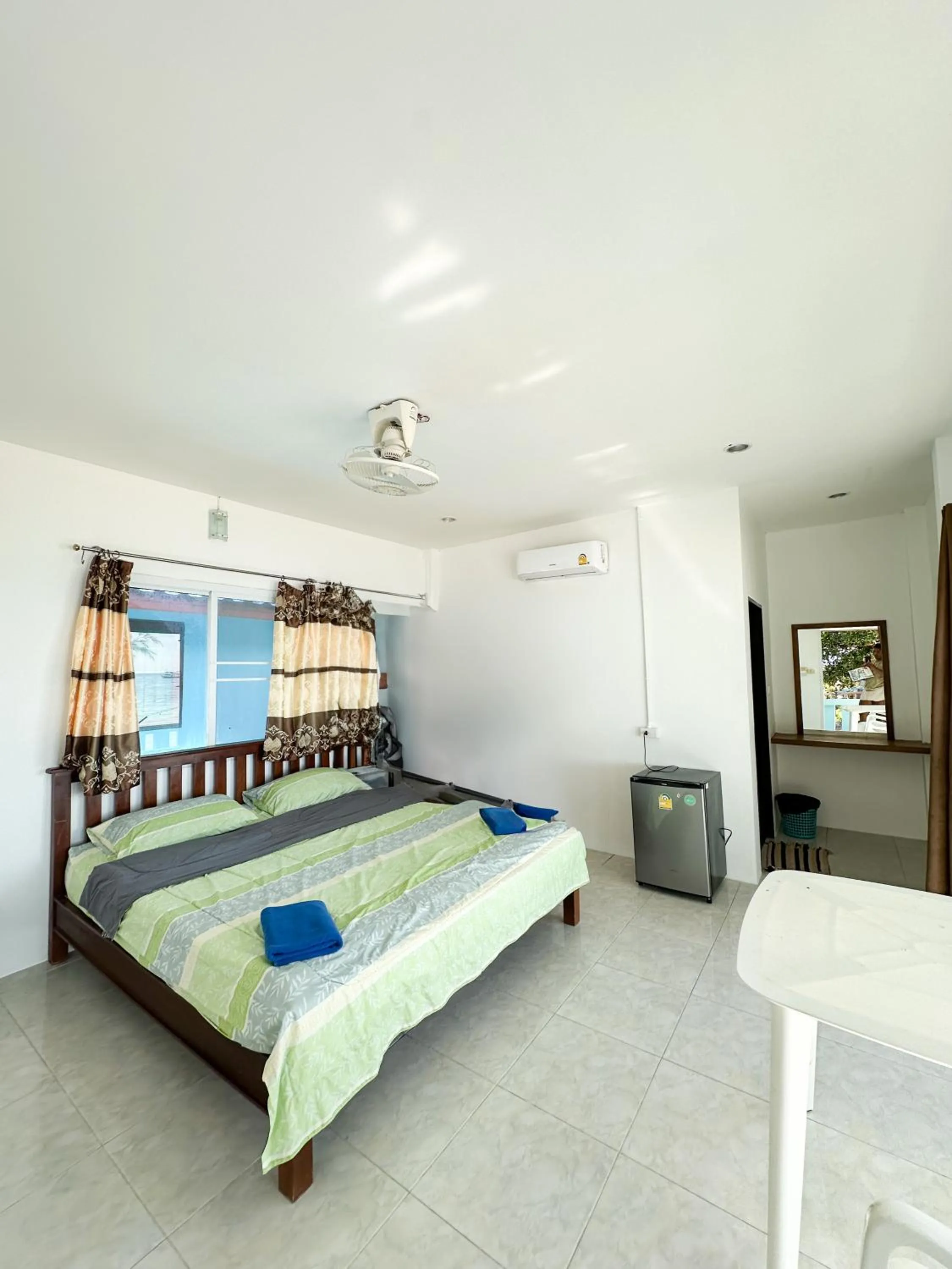 Bed in O'chai Bungalows