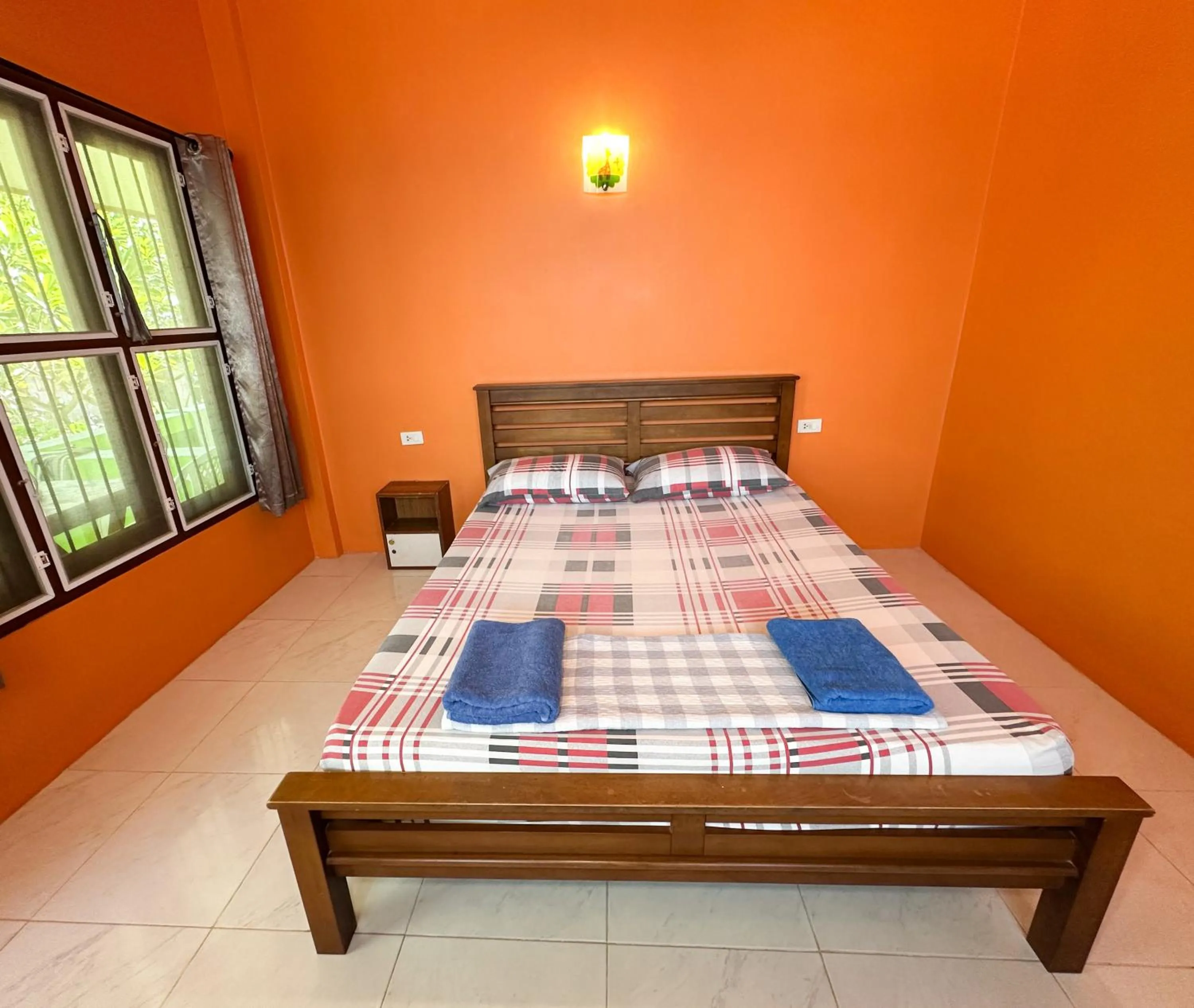 Bed in O'chai Bungalows