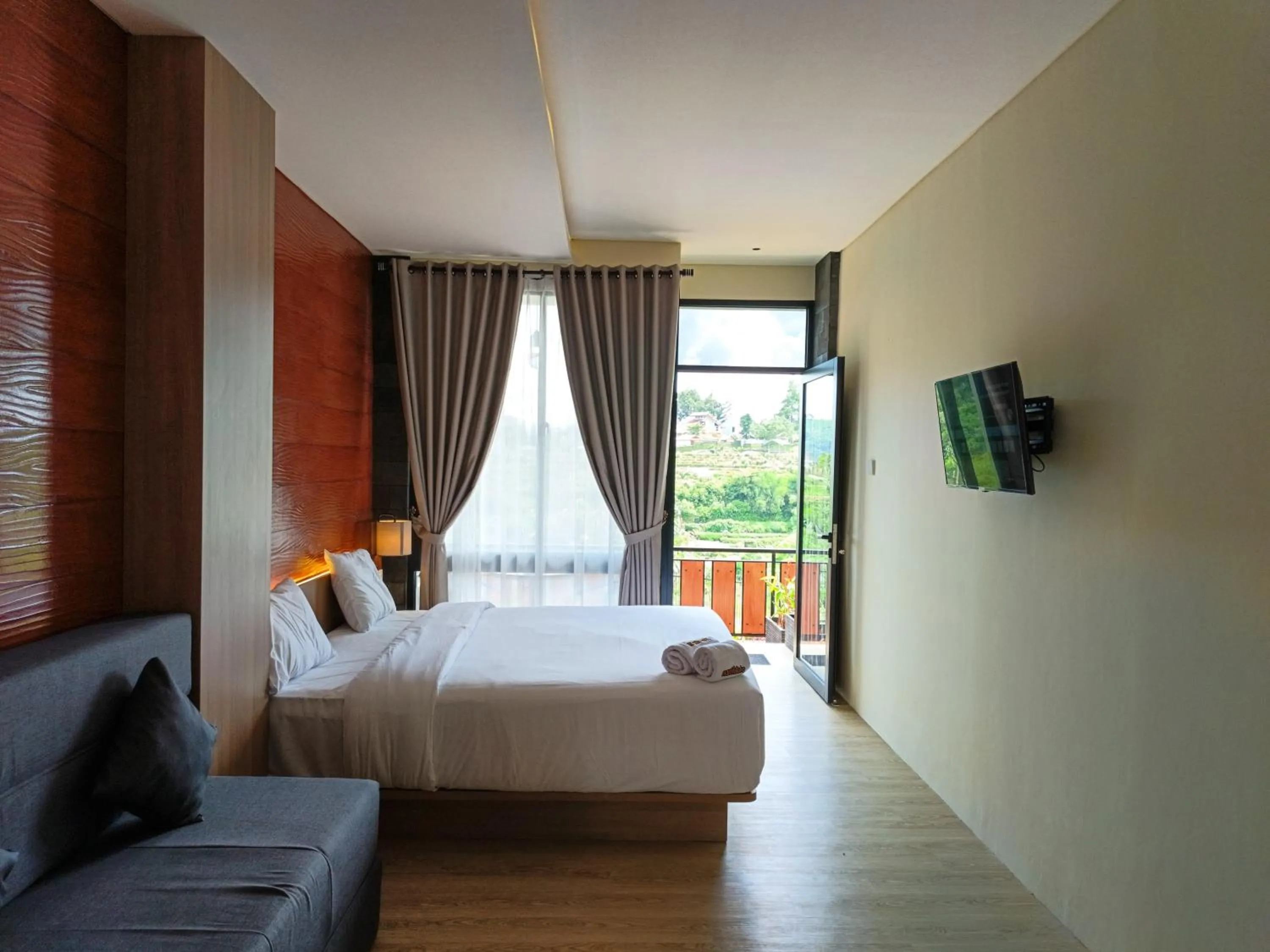 Bed in Mamifokobo Hotel & Glamping