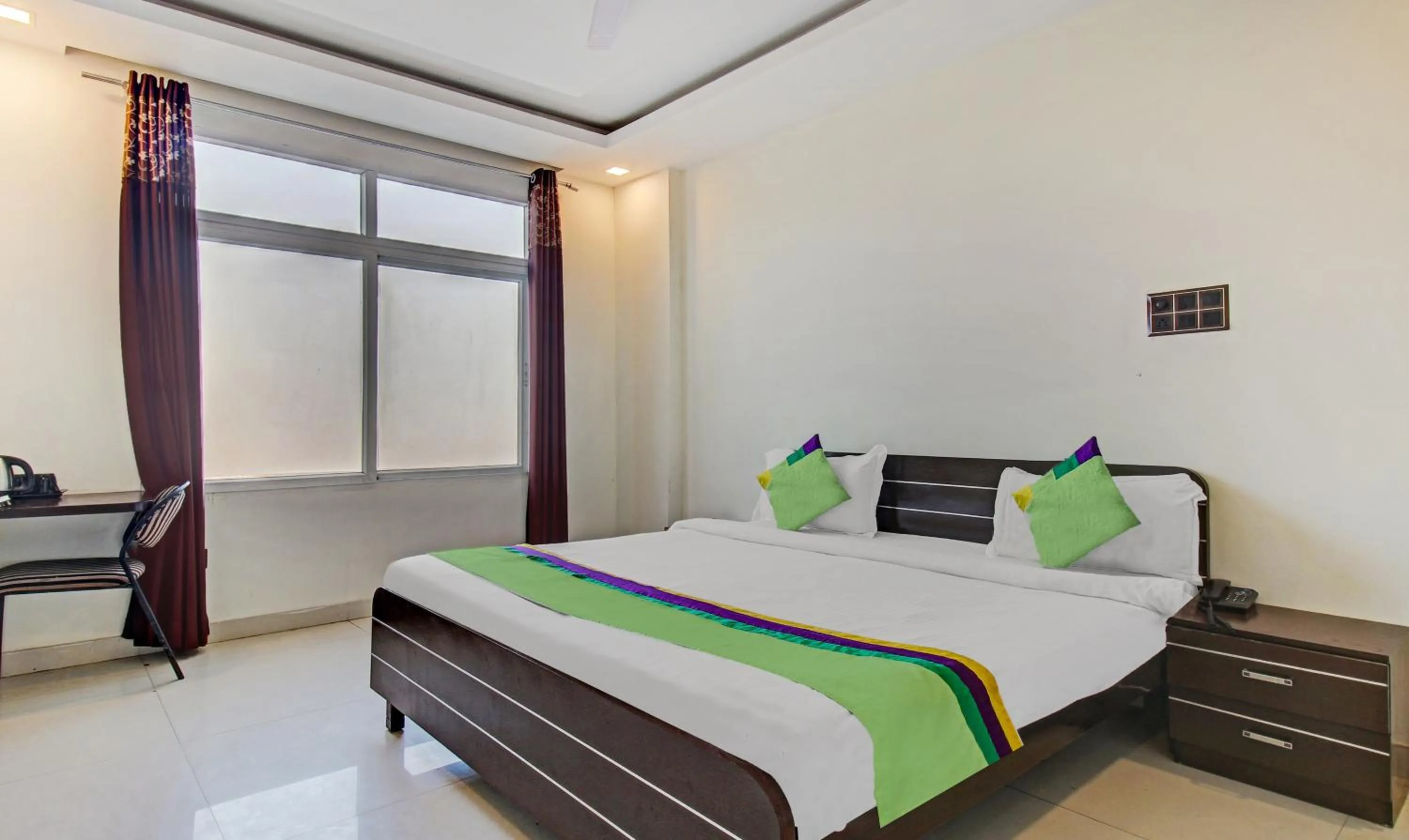 Bedroom, Bed in Treebo Silver Grand