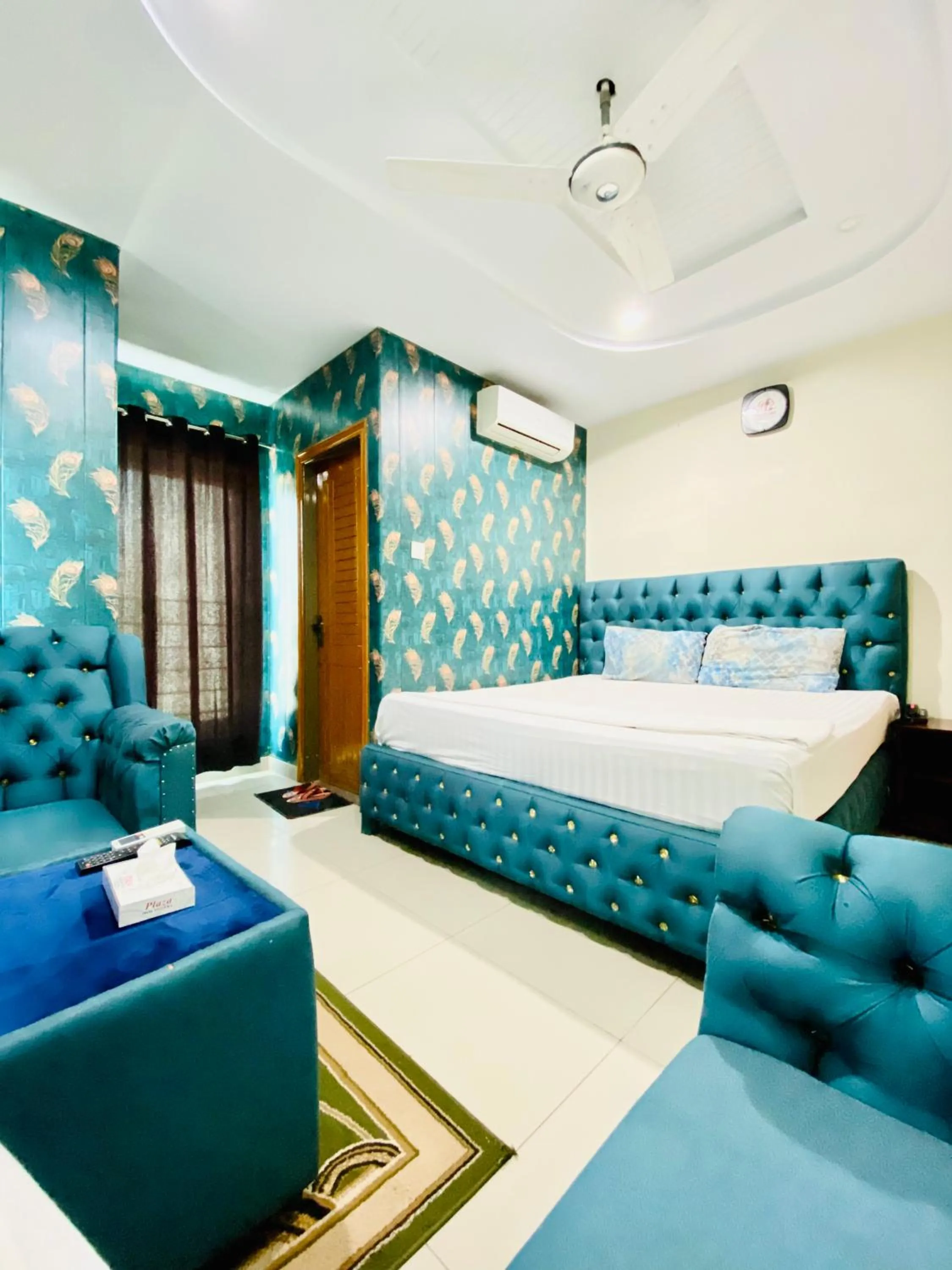 Bed in Plaza Inn Hotel