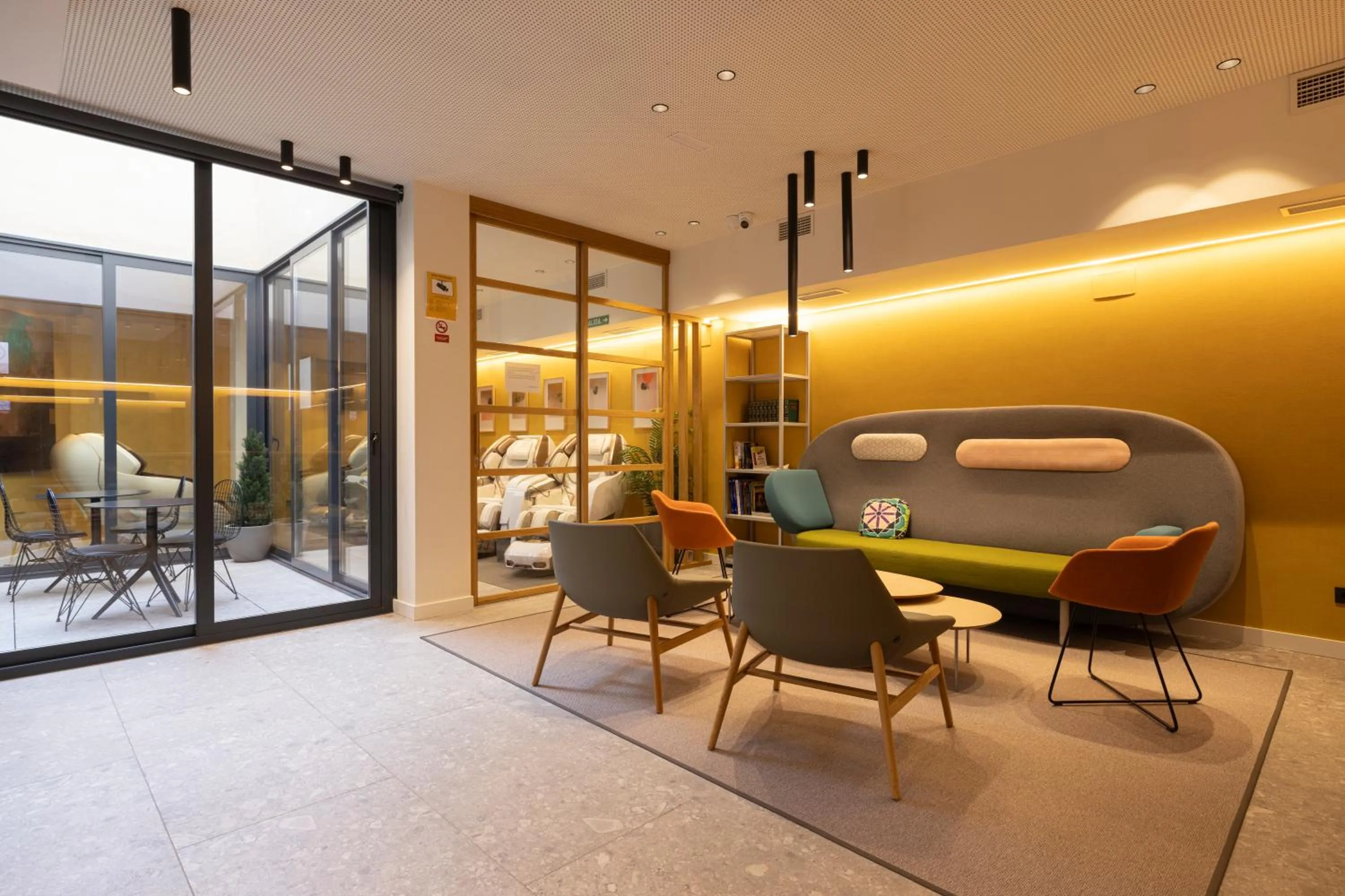 Communal lounge/ TV room in Inn Boutique León