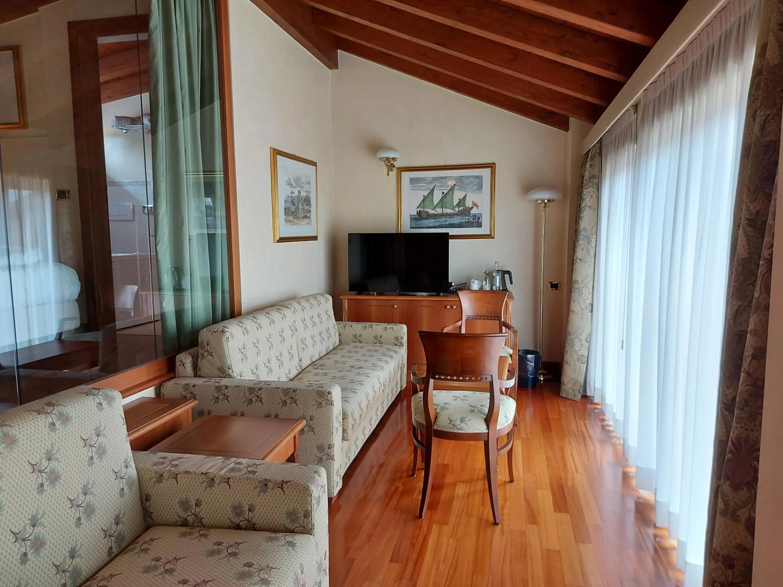 Seating area in Phi Hotel Dei Medaglioni