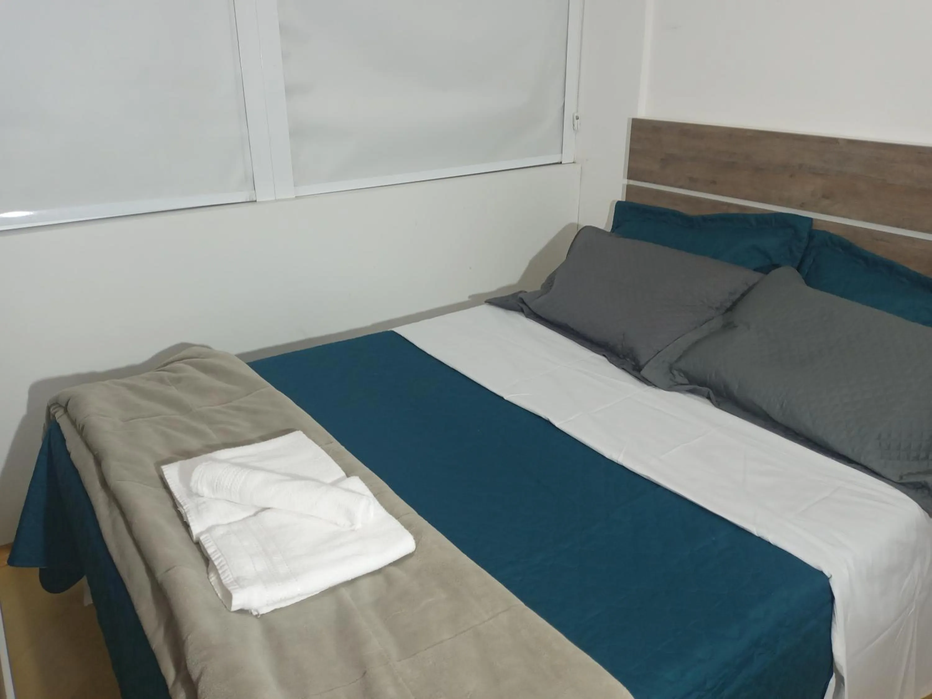 Bed in Apartamento encantador em Curitiba