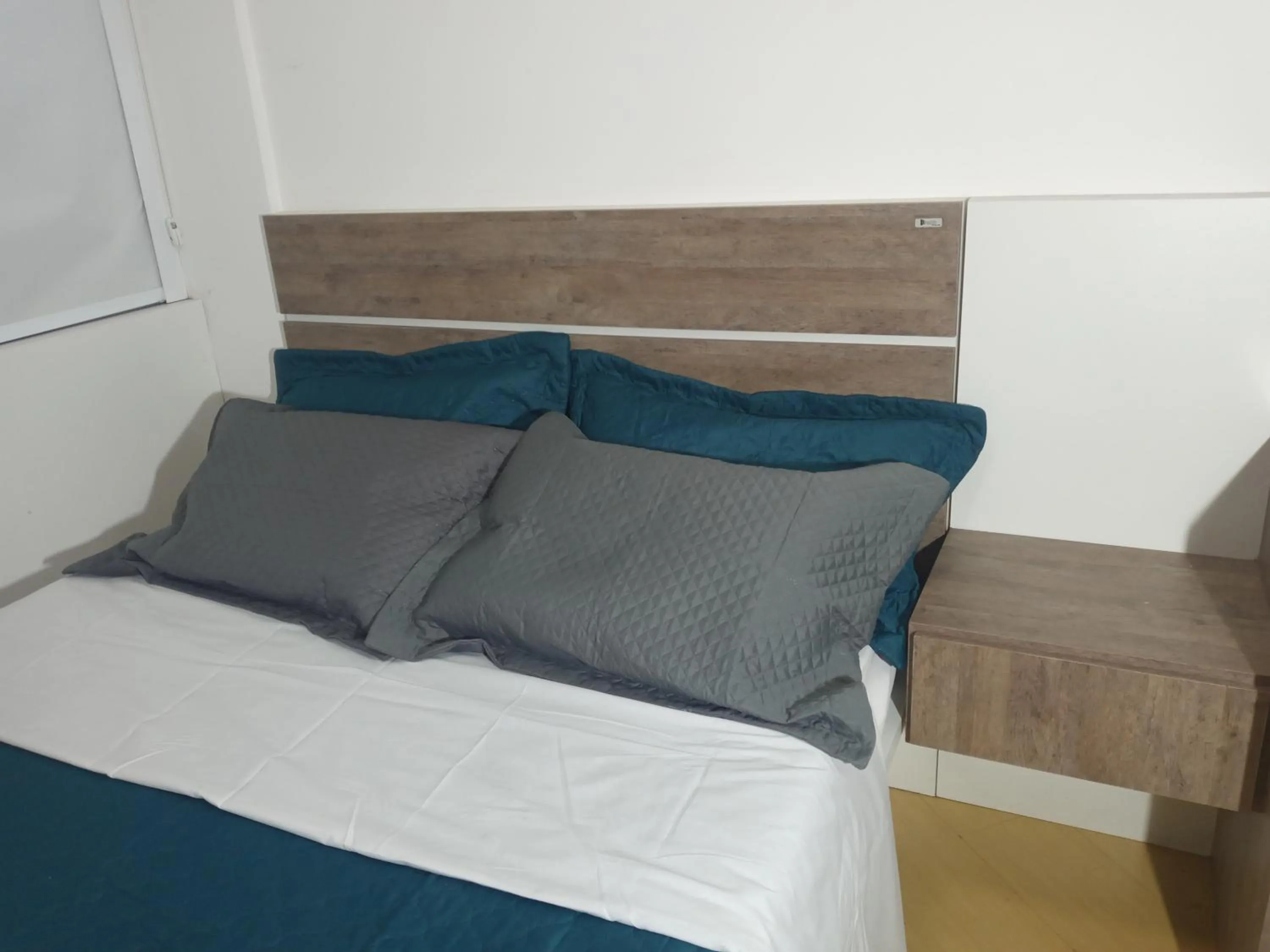 Bed in Apartamento encantador em Curitiba